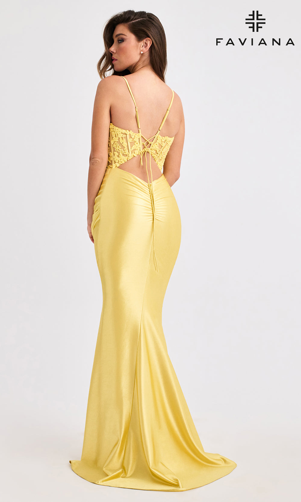 Yellow evening dress with lace detailing and criss cross back with adjustable straps and designed by Faviana.