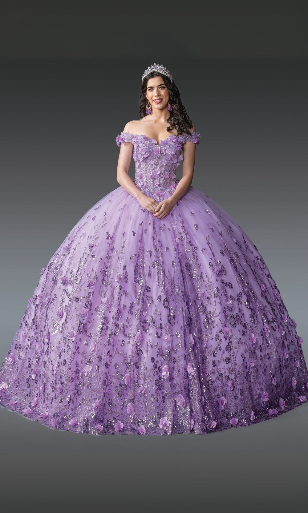Woman wearing a purple floral off-shoulder gown against a gray background