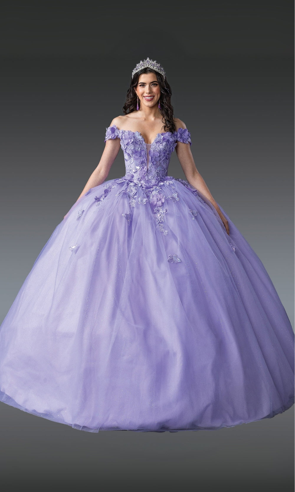Woman wearing a purple ball gown with floral details on a dark background