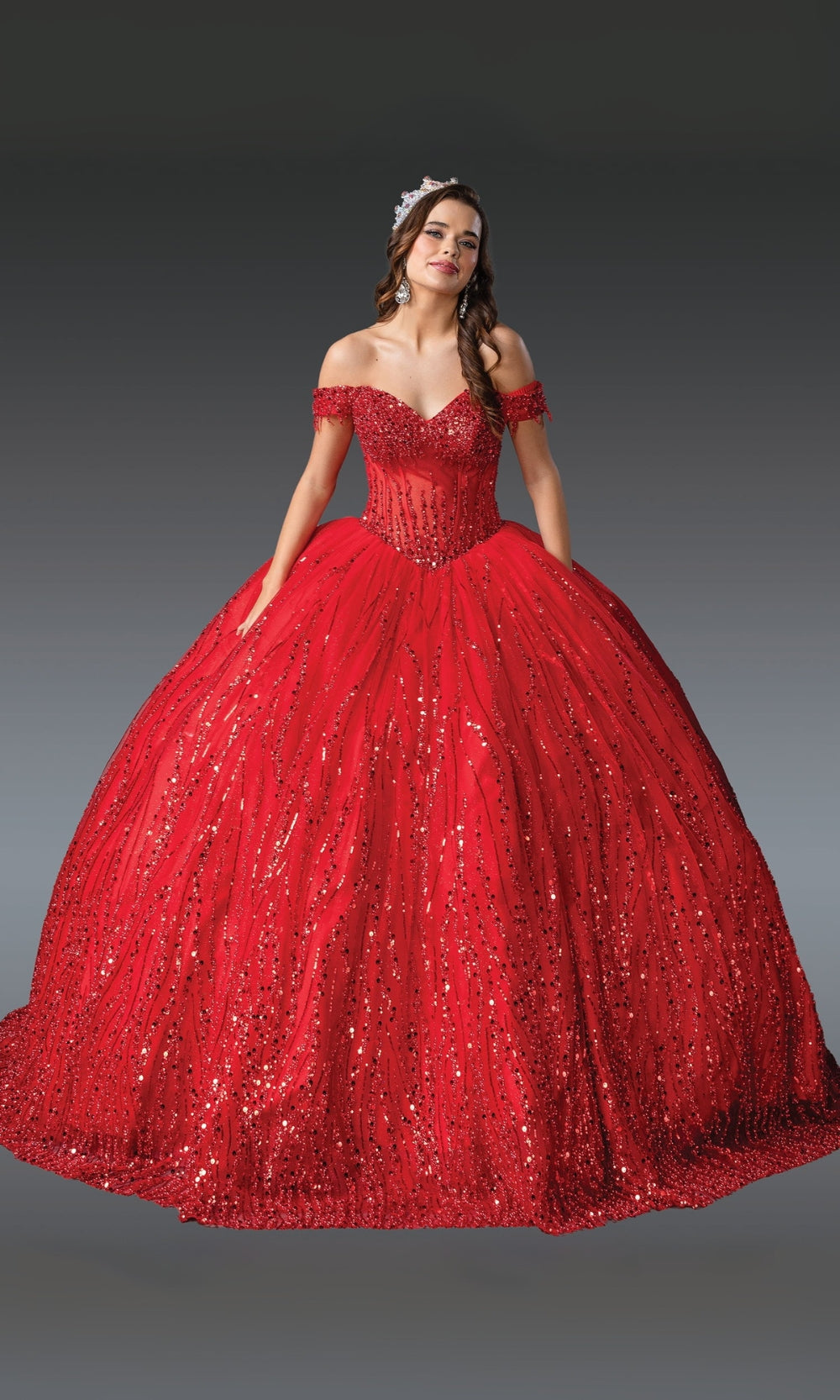 Red ball gown with sequin details on a plain background