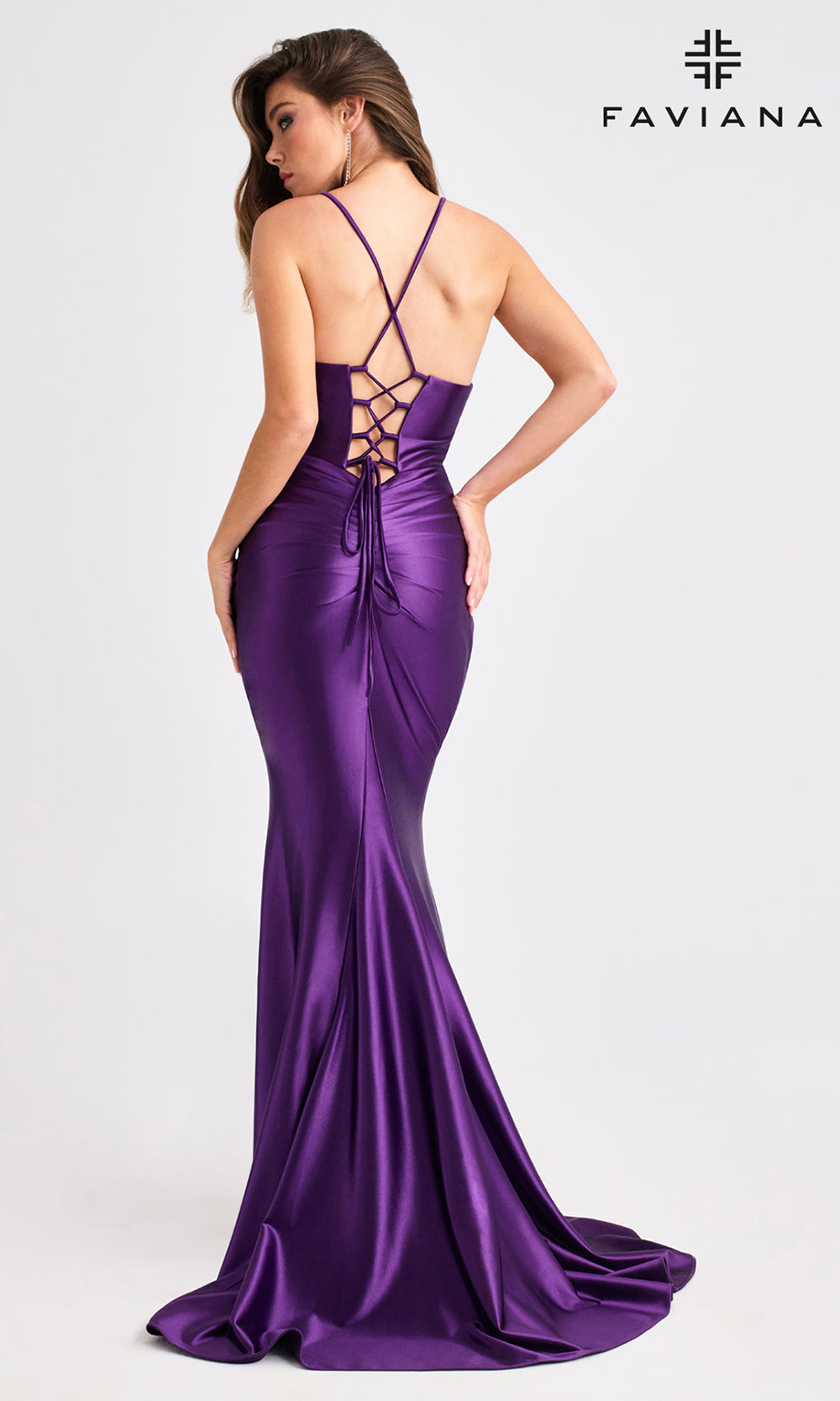 Purple evening gown with lace-up back on a white background, featuring the Faviana brand.