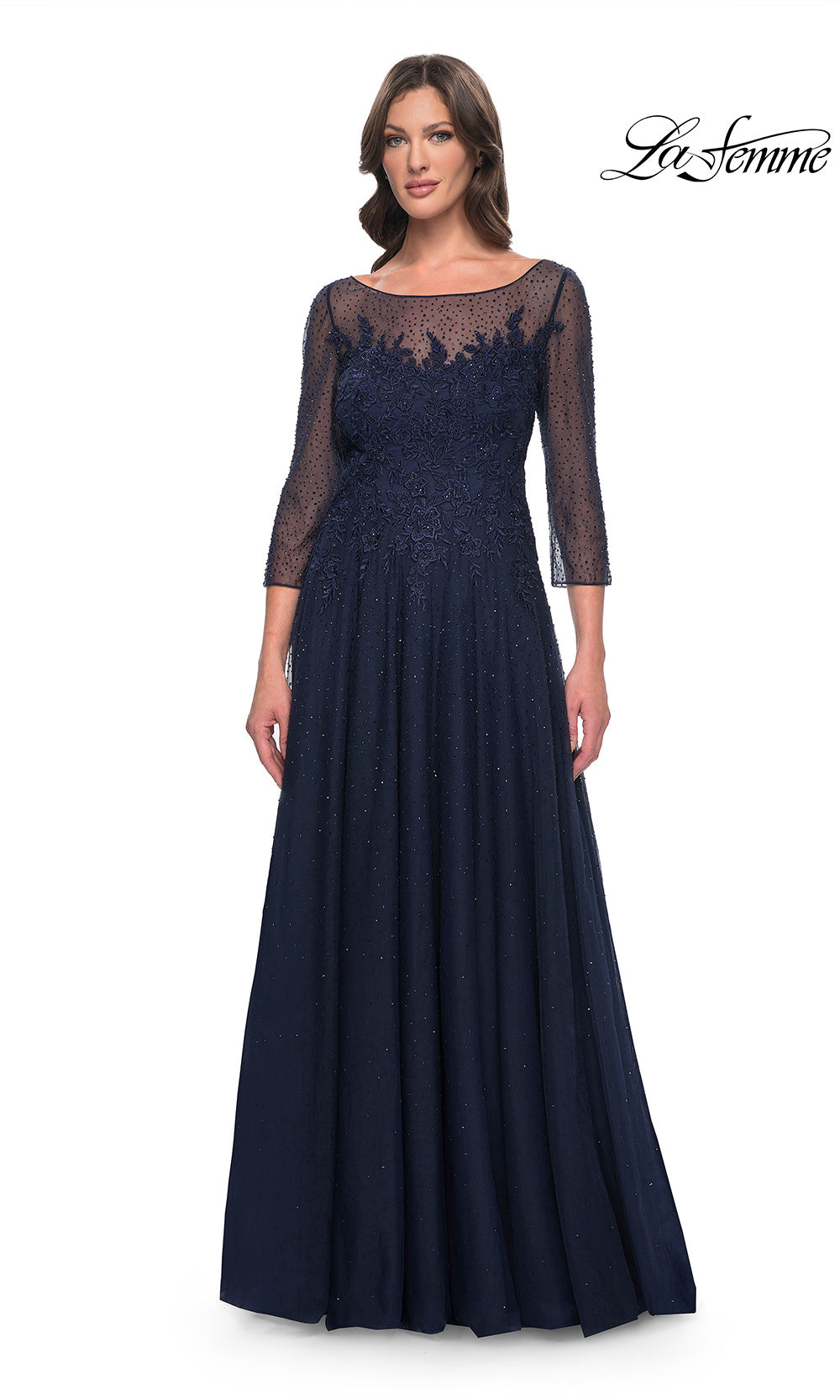 Navy blue evening gown with lace detailing on a white background