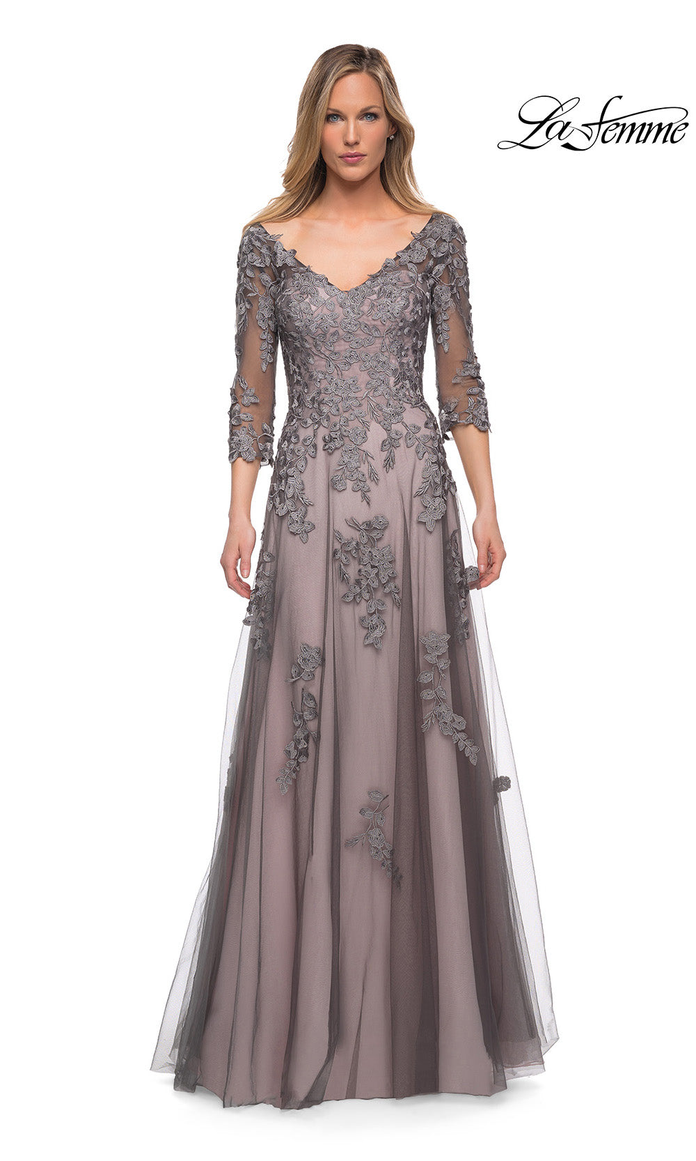 Long evening gown with lace detailing on a white background