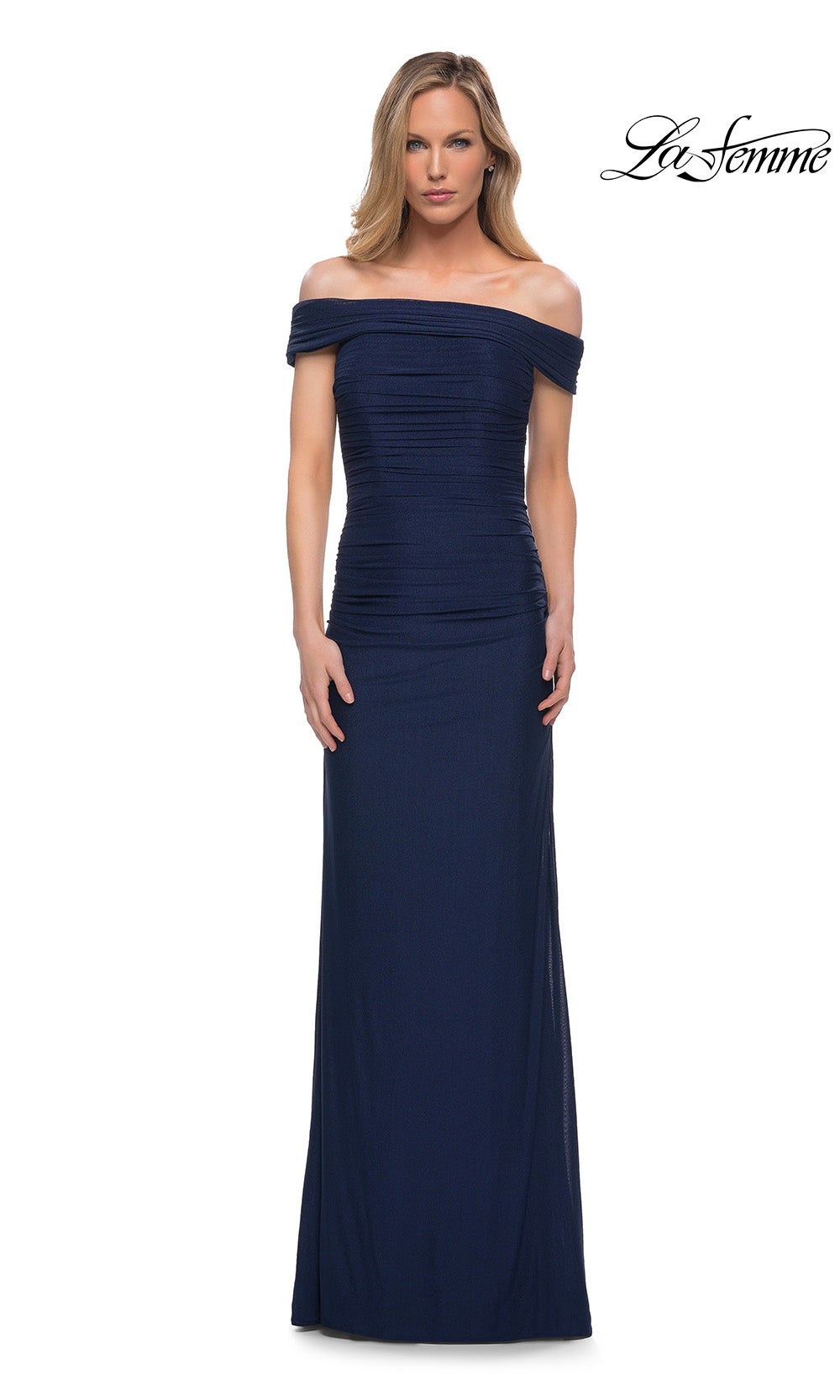 Navy off-shoulder gown on a white background with 'La Femme' branding.