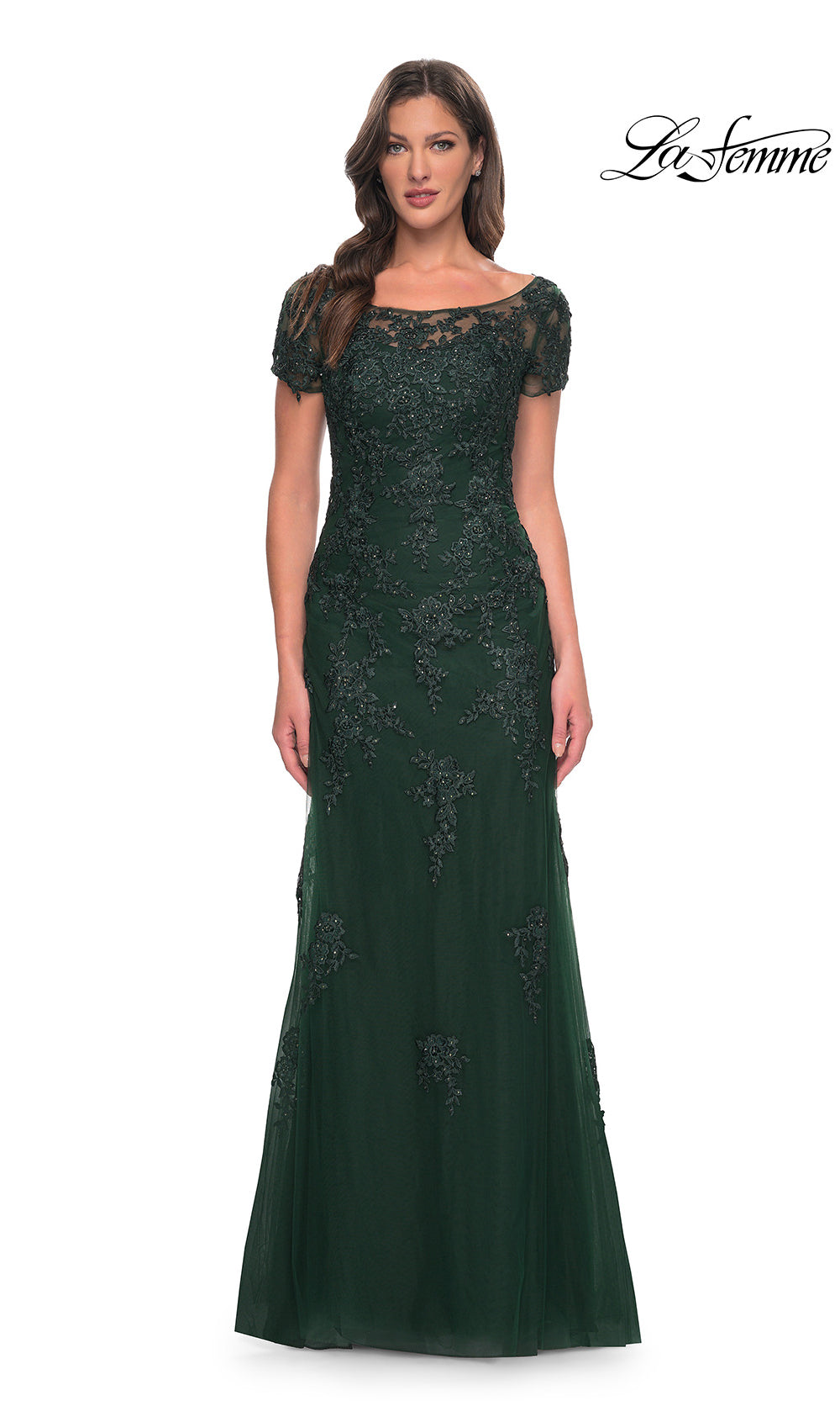 Woman wearing a Emerald lace evening gown on a white background