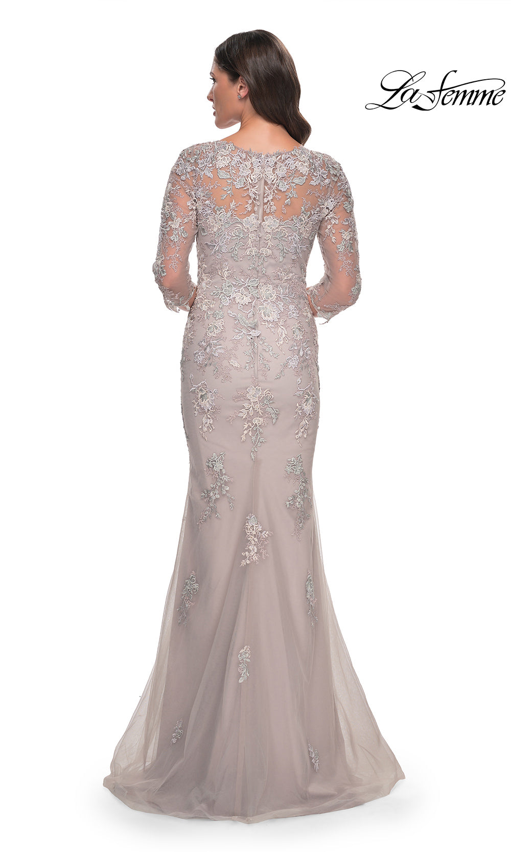 Elegant evening gown with floral embroidery on a white background