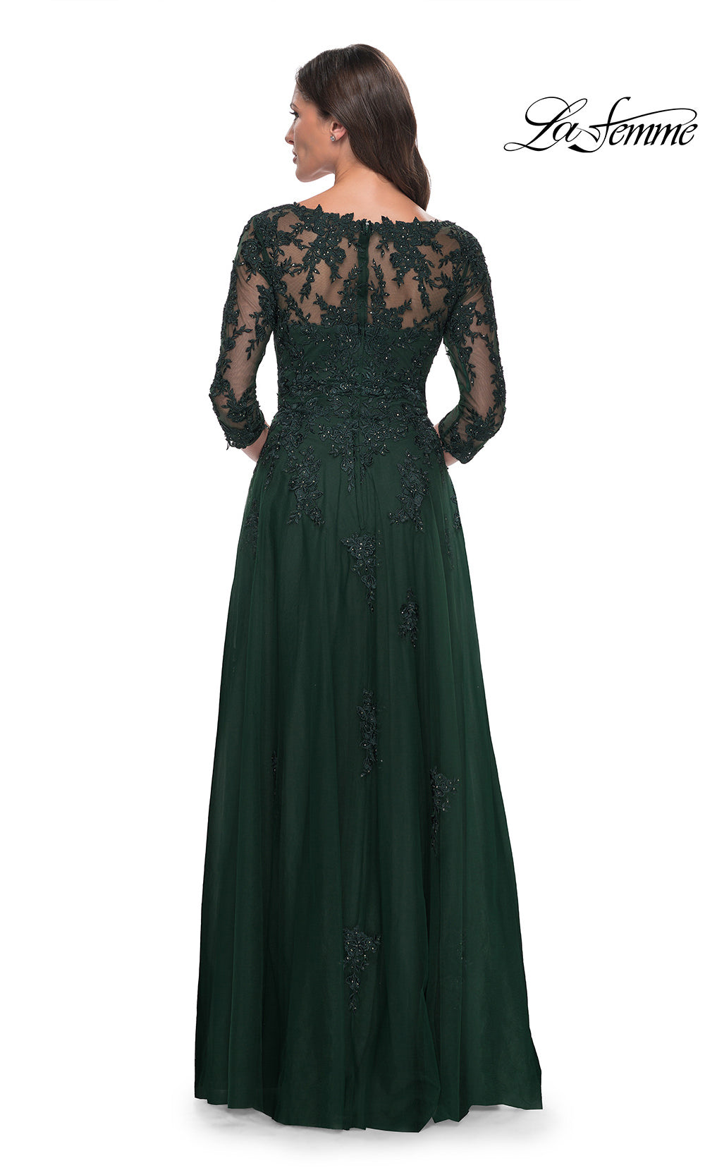Green evening gown with lace detailing on a white background