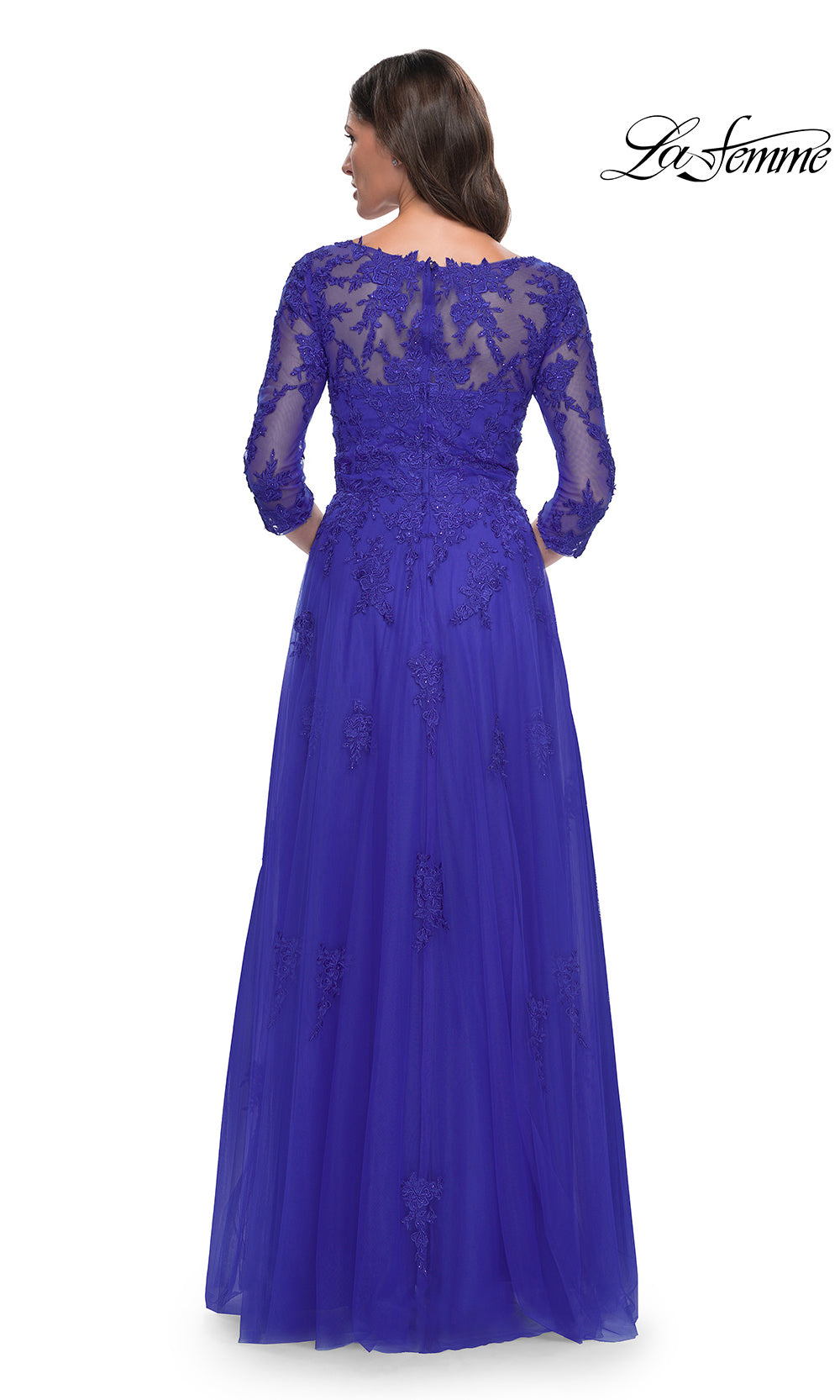 Blue evening gown with lace detailing on a white background