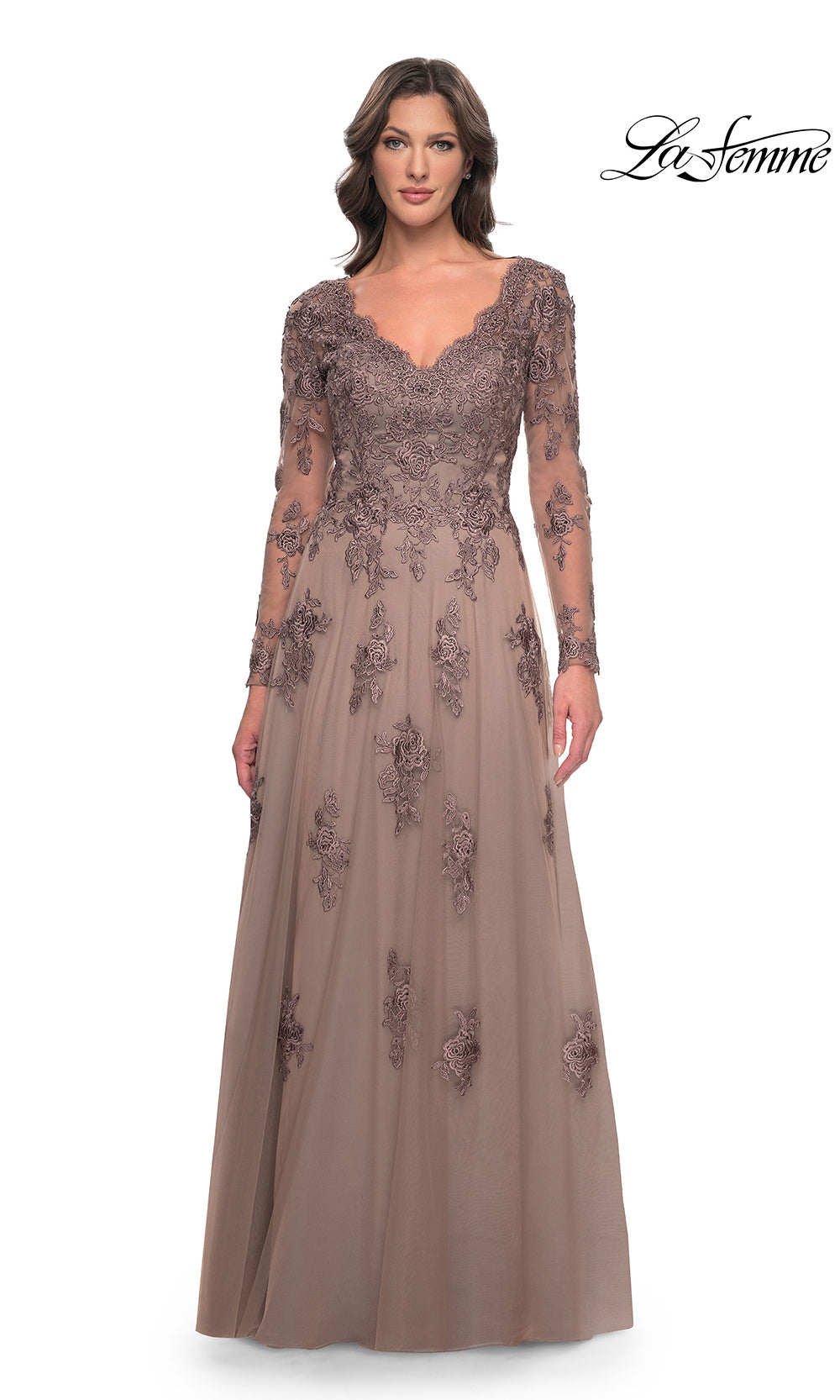 Long, elegant evening gown with lace detailing on a white background