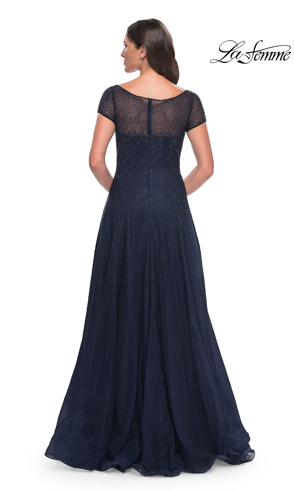 Navy blue evening gown with lace cap sleeves on a white background