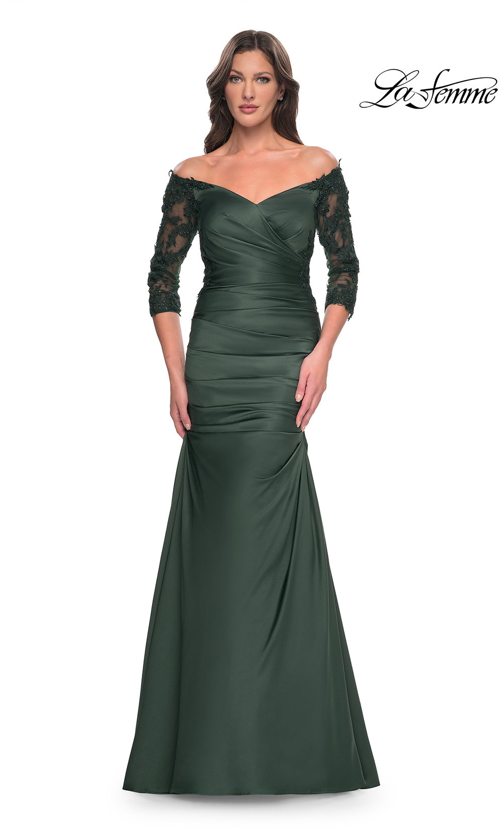 Green evening gown with lace sleeves on a white background