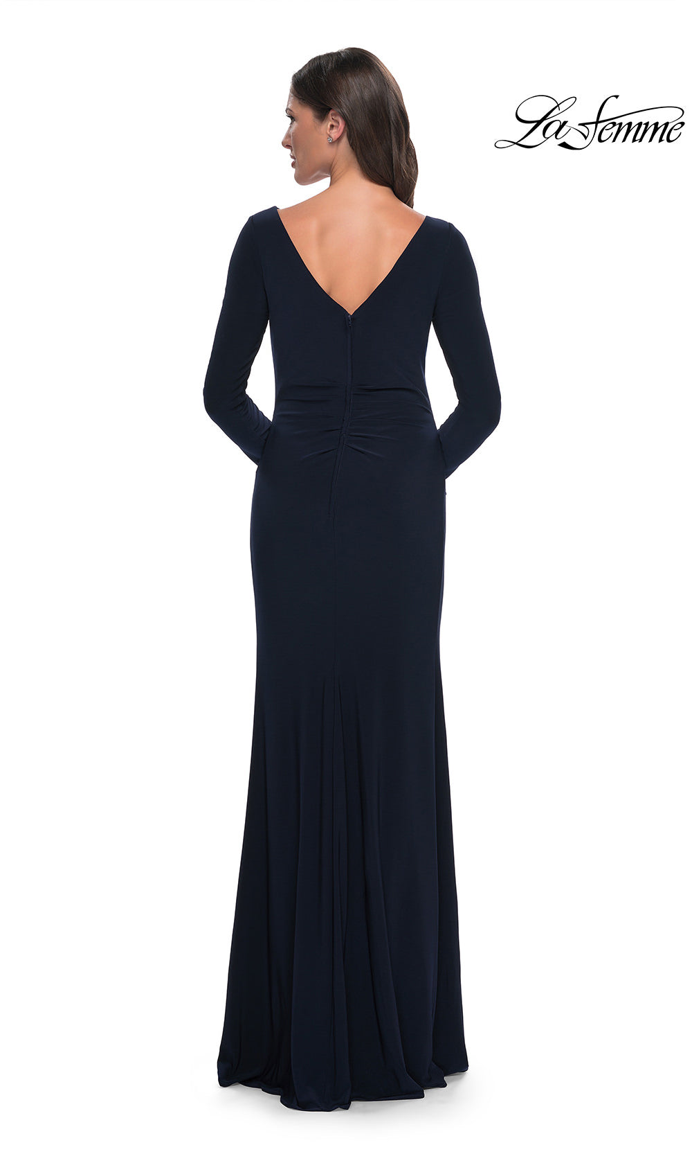 Navy blue evening gown with a deep V-neck and long sleeves on a white background, branded 'La Femme'.