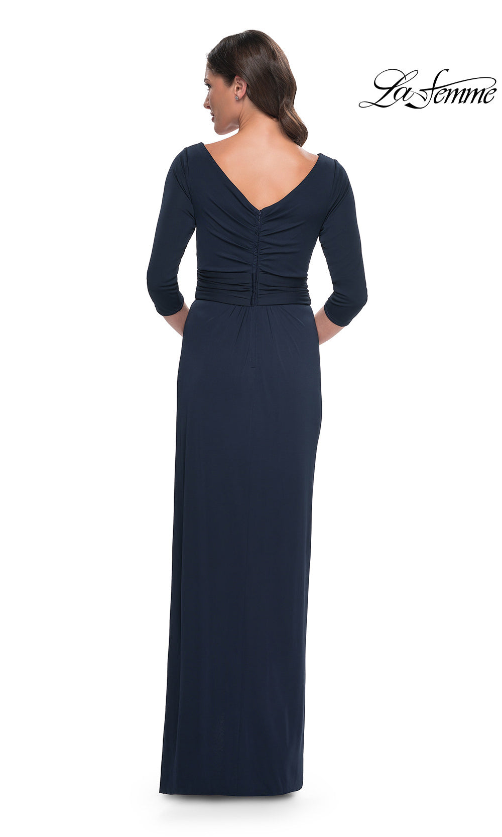 Navy blue evening gown with long sleeves on a white background, brand 'La Femme' visible.