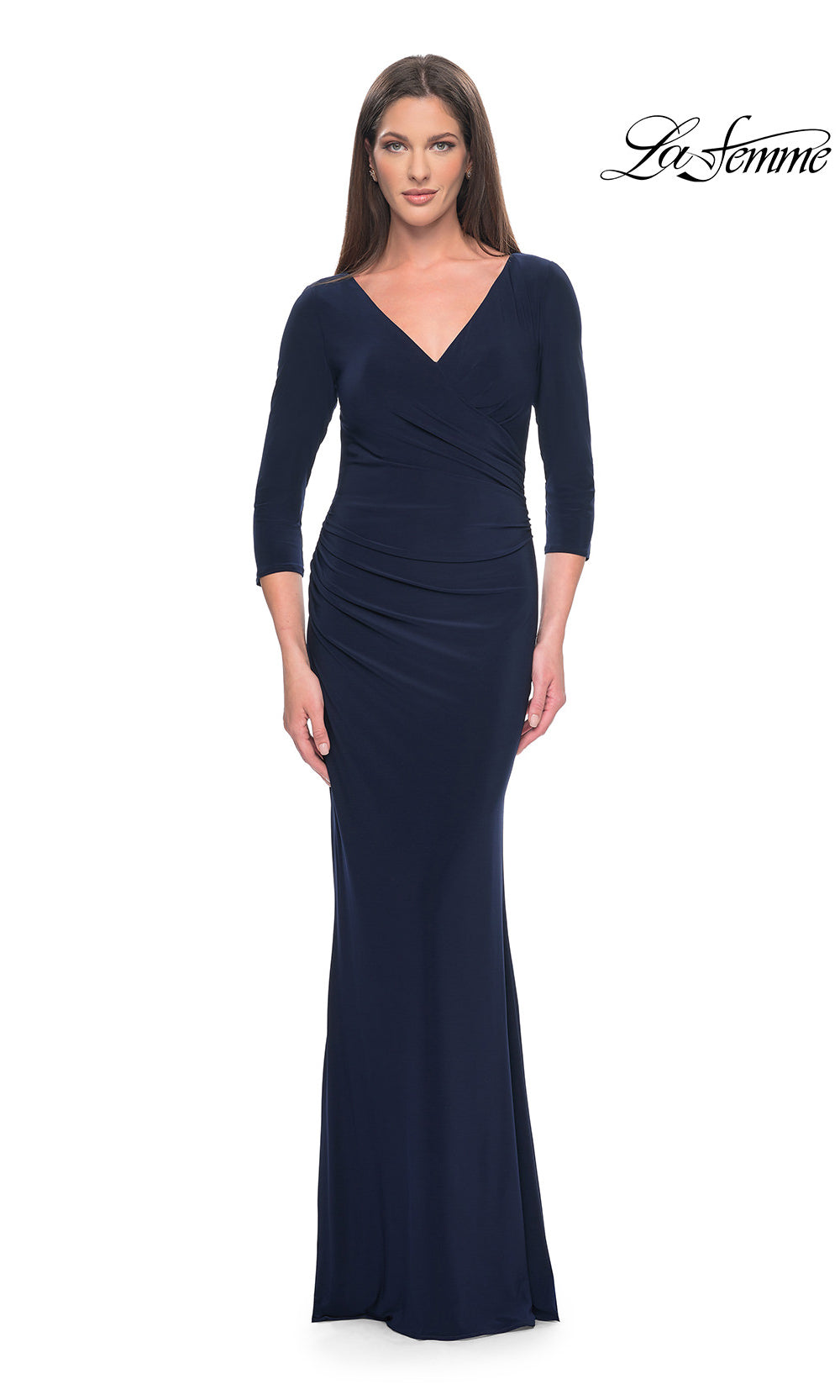 Navy blue evening gown with a V-neck and 3/4 sleeves on a white background, brand 'La Femme' visible.