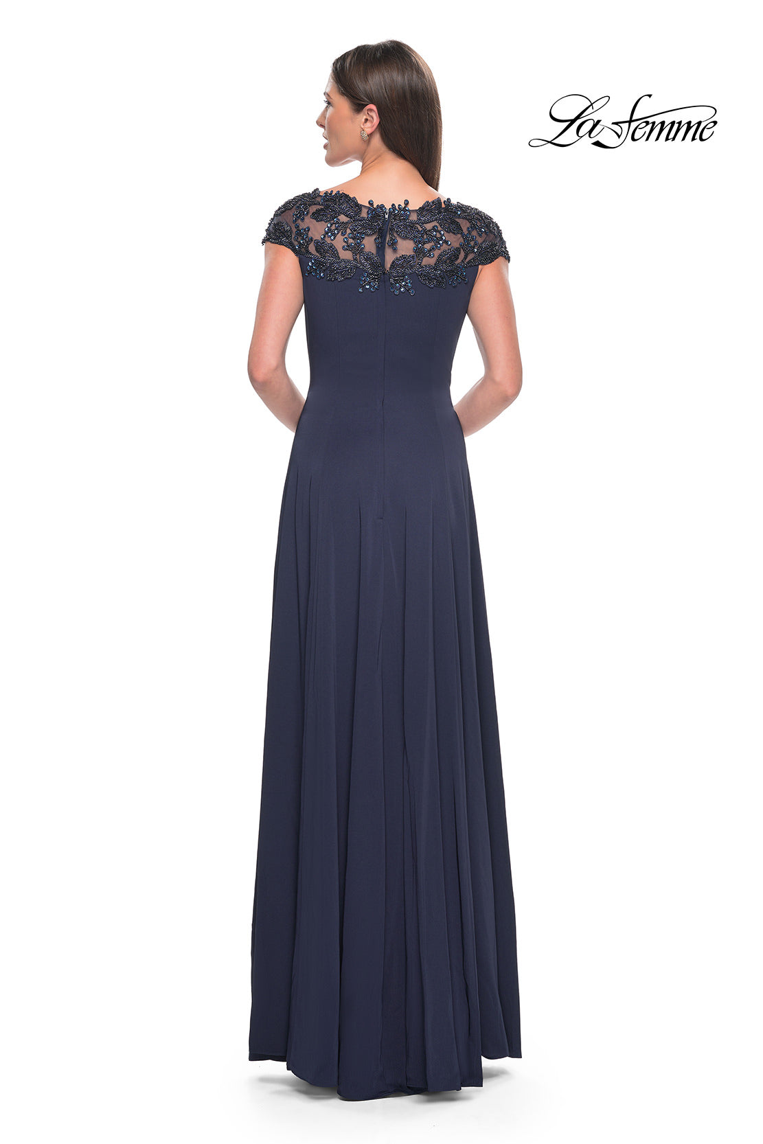 Navy blue evening gown with lace cap sleeves on a white background