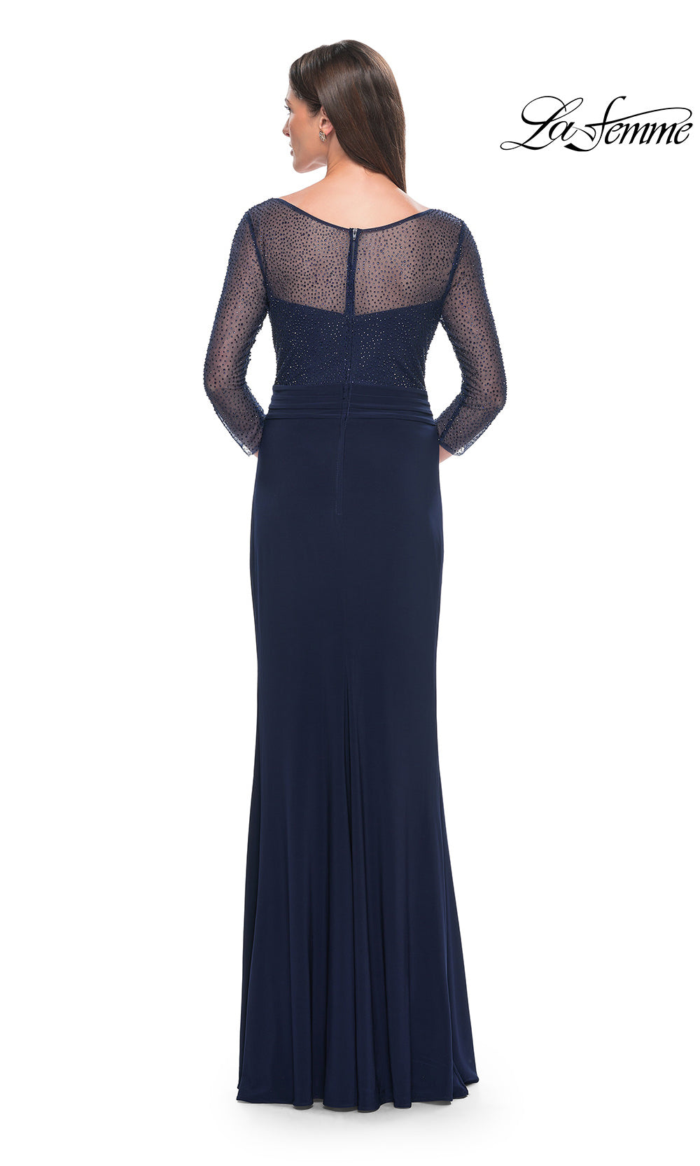 Navy blue evening gown with sheer back on a white background, brand 'La Femme' visible.