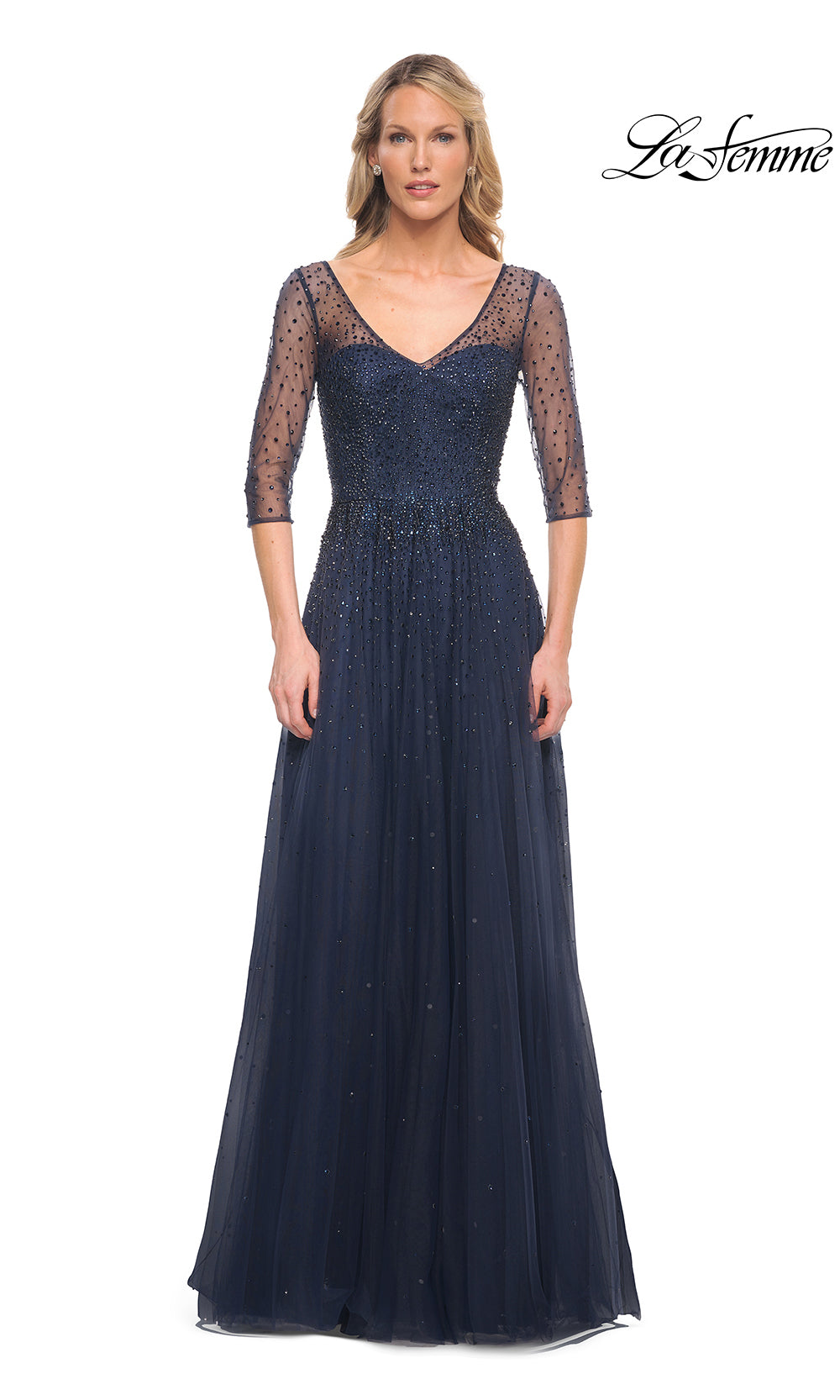 Navy blue evening gown with sheer sleeves on a white background