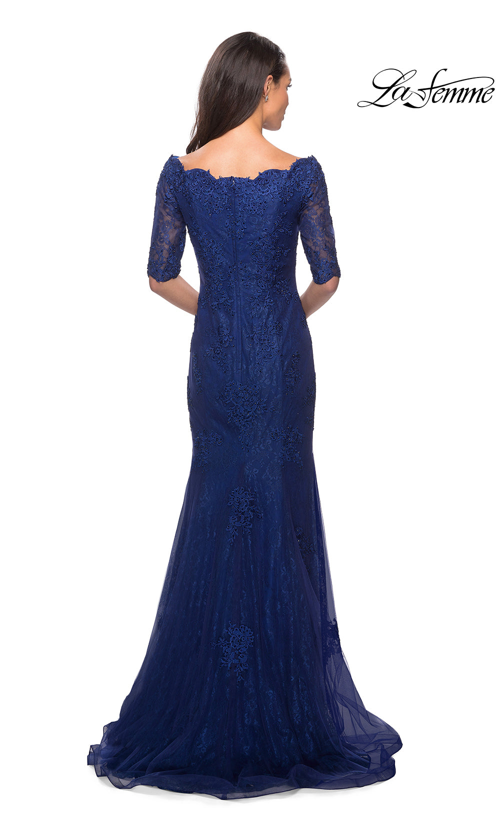 Navy blue evening gown with lace detailing on a white background