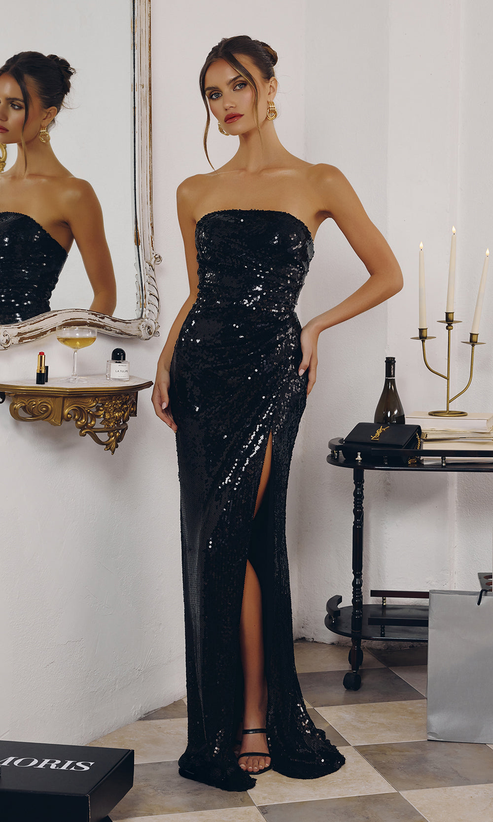 LaDivine T724 black strapless sequin pageant gown — straight-on front view of the fitted silhouette