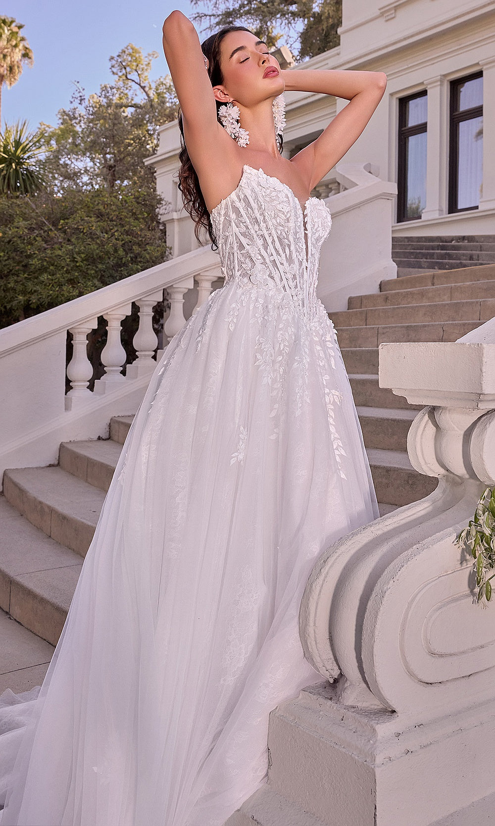 Andrea and Leo WL075 Off White wedding ballgown side three-quarter view with tulle court train, spaghetti straps, lace-embroidered corset bodice, A-line silhouette, bridal shower styling