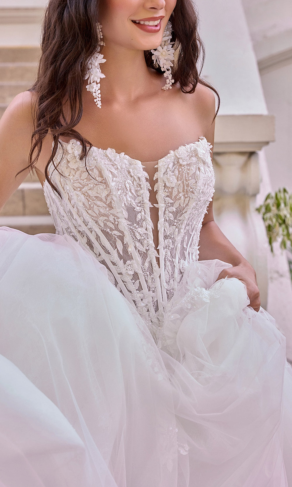 Andrea and Leo WL075 Off White wedding ballgown bodice close-up showing sweetheart neckline, sheer boning channels, beaded floral lace appliqués, embroidery detail, engagement party dress