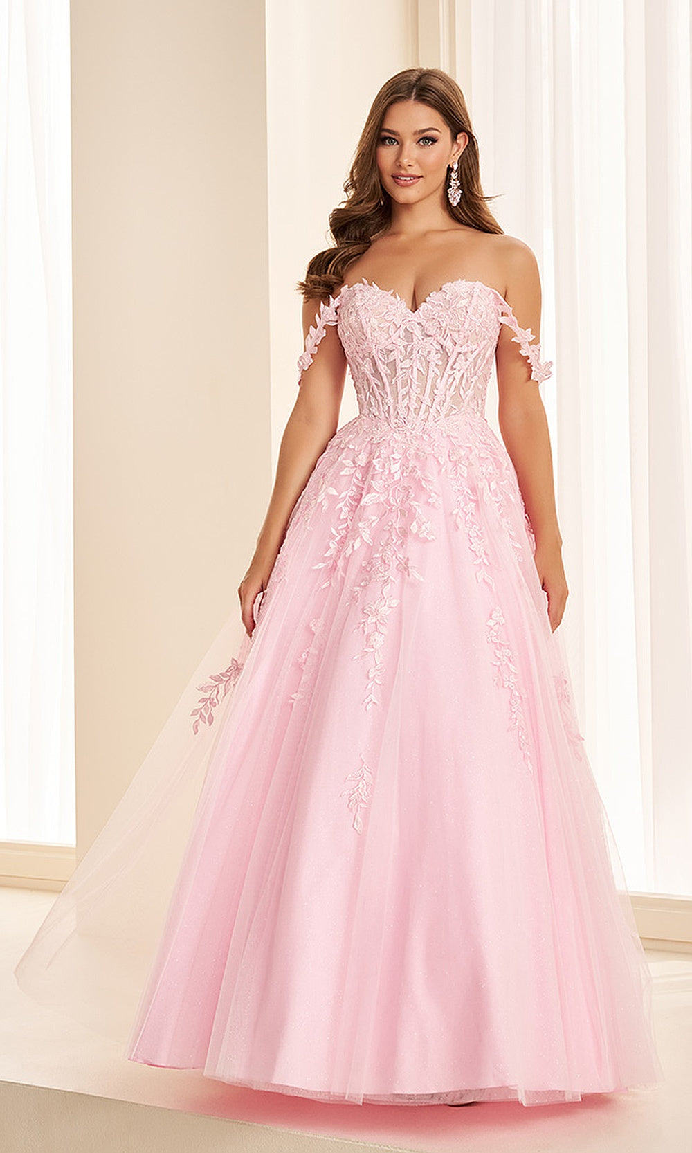 Ellie Wilde EW37028 Light Pink prom dress front view with glitter tulle, floral appliqués and embroidery, off-shoulder sweetheart neckline, boned corset ballgown silhouette, gala gown.