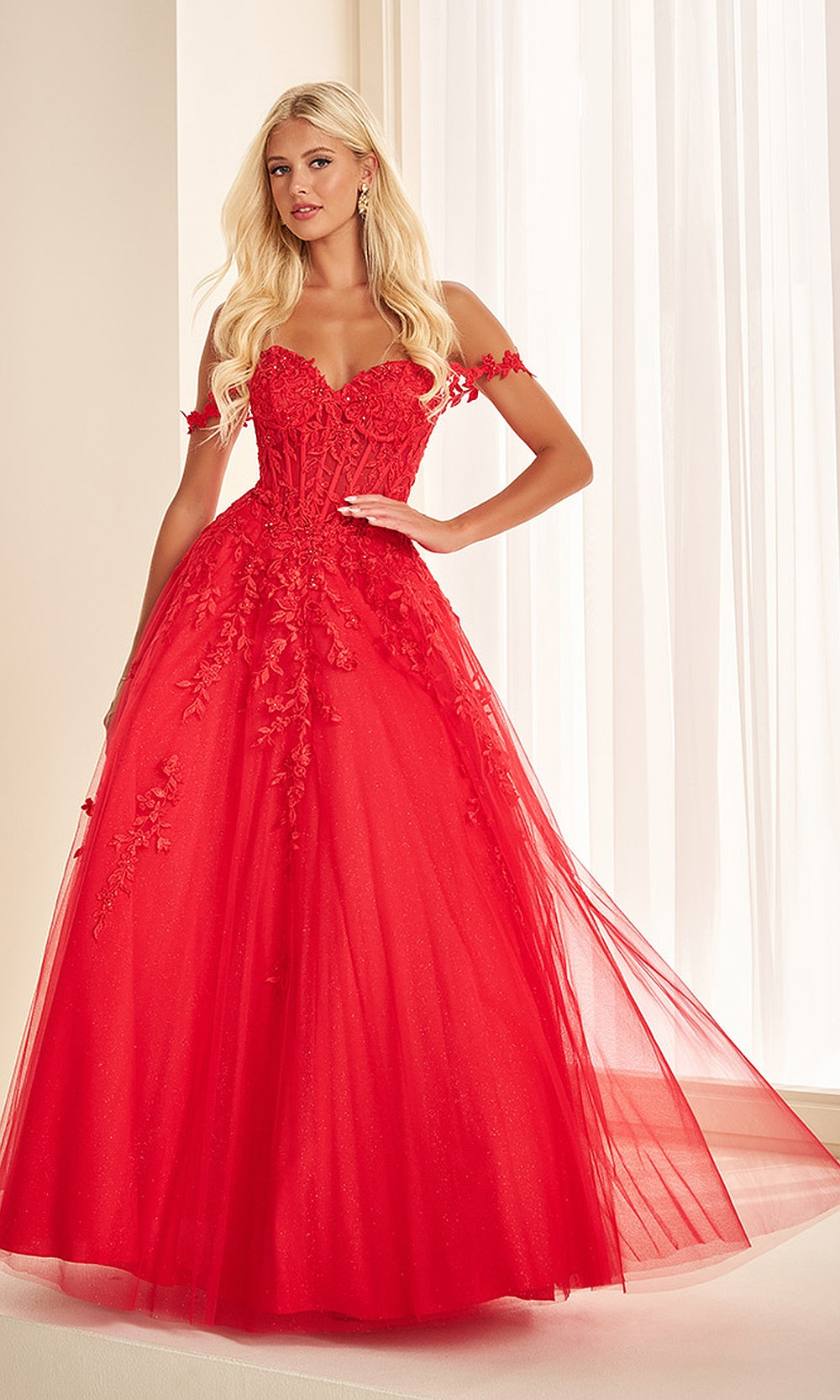 Ellie Wilde EW37028 Red prom dress front view with lace and tulle, beaded floral appliqués, off-shoulder sweetheart neckline, corset ballgown silhouette, formal prom gown.