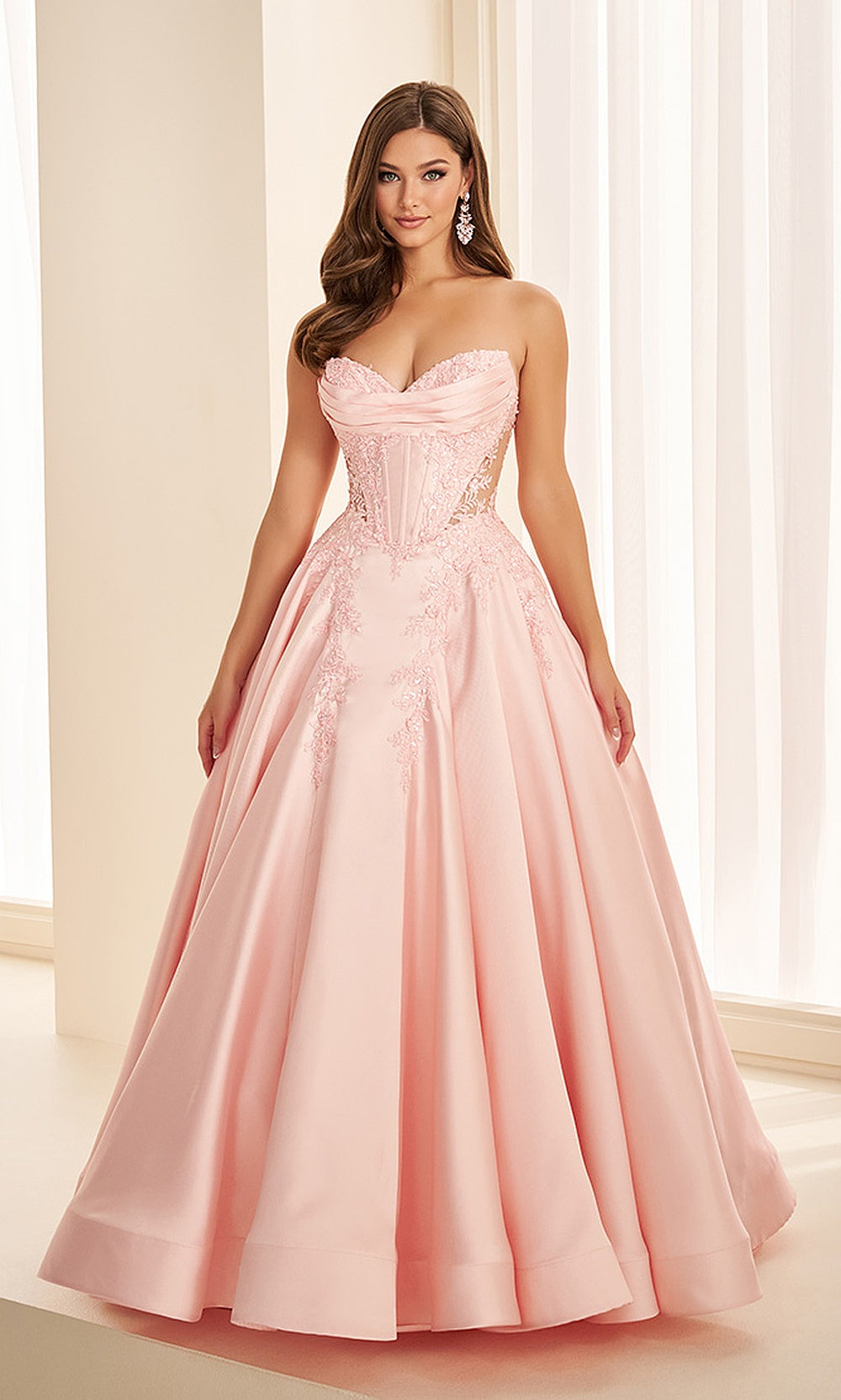 Ellie Wilde EW37082 Blush prom dress front view with satin fabric, beaded floral appliqués, strapless sweetheart ballgown silhouette, formal prom gown.