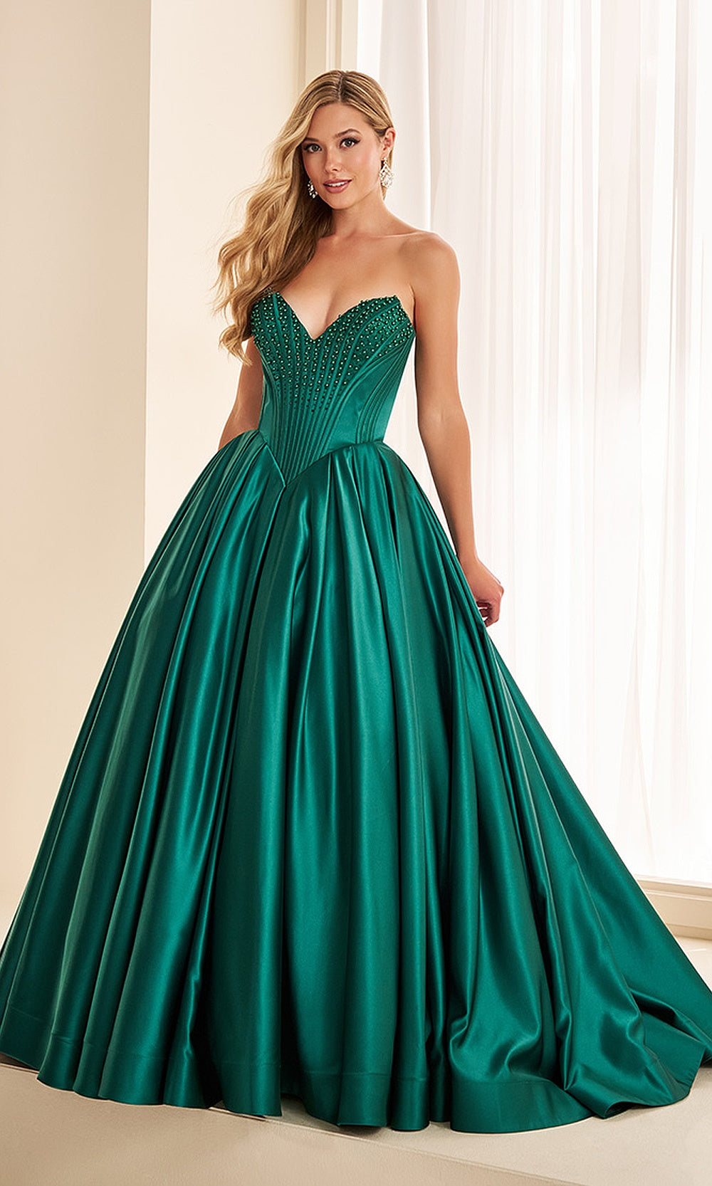 Ellie Wilde EW38020 Emerald prom dress front view with beaded satin, sweetheart neckline, full ballgown silhouette, radiant formal prom gown.