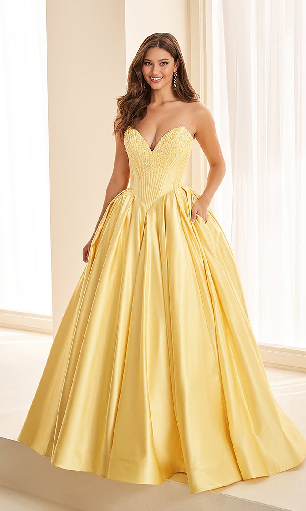 Ellie Wilde EW38020 Light Yellow prom dress front view with beaded satin, sweetheart neckline, ballgown silhouette, stunning formal prom gown.