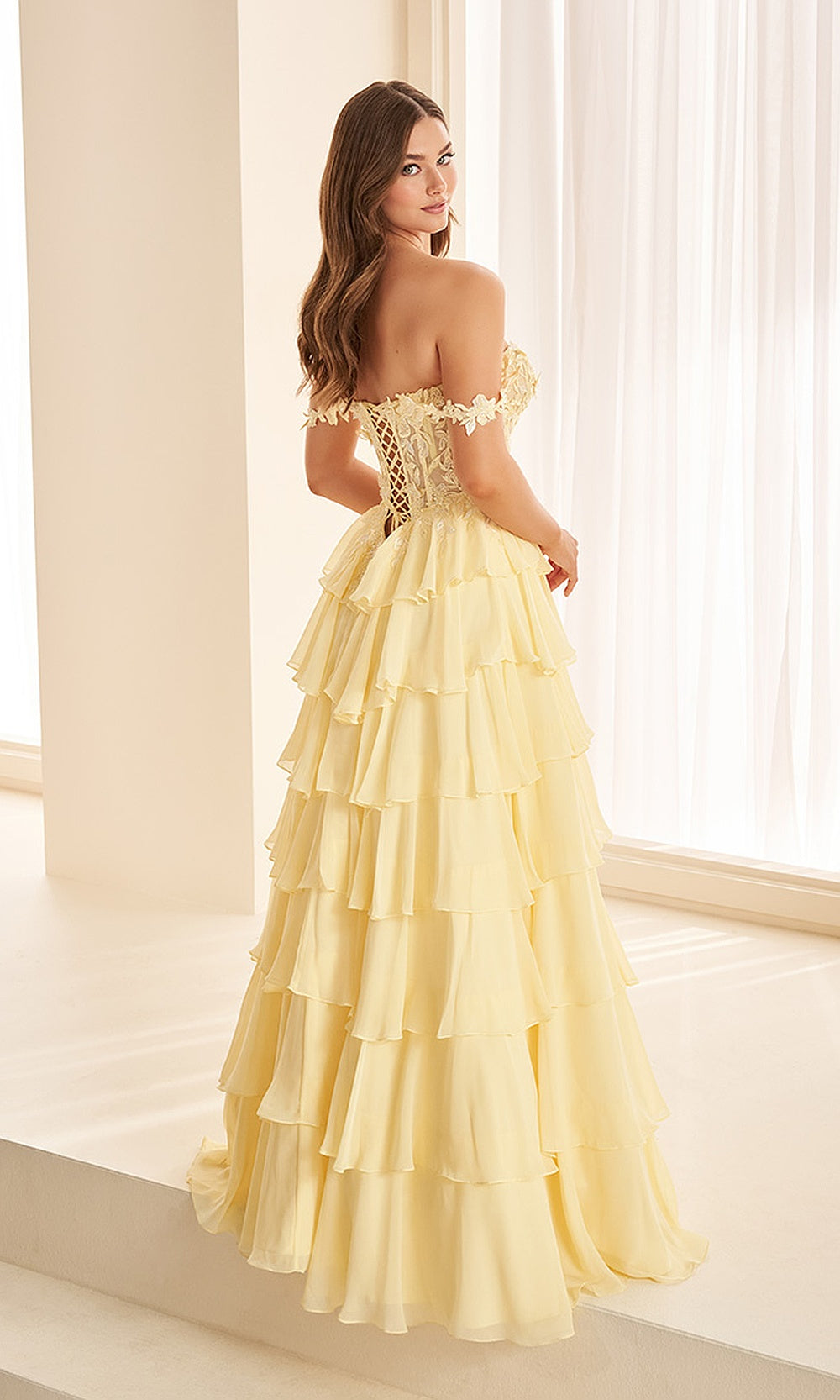 Ellie Wilde EW38093 Light Yellow prom dress back view with flowing chiffon skirt, corset lace-up back closure and A-line silhouette, evening gown.