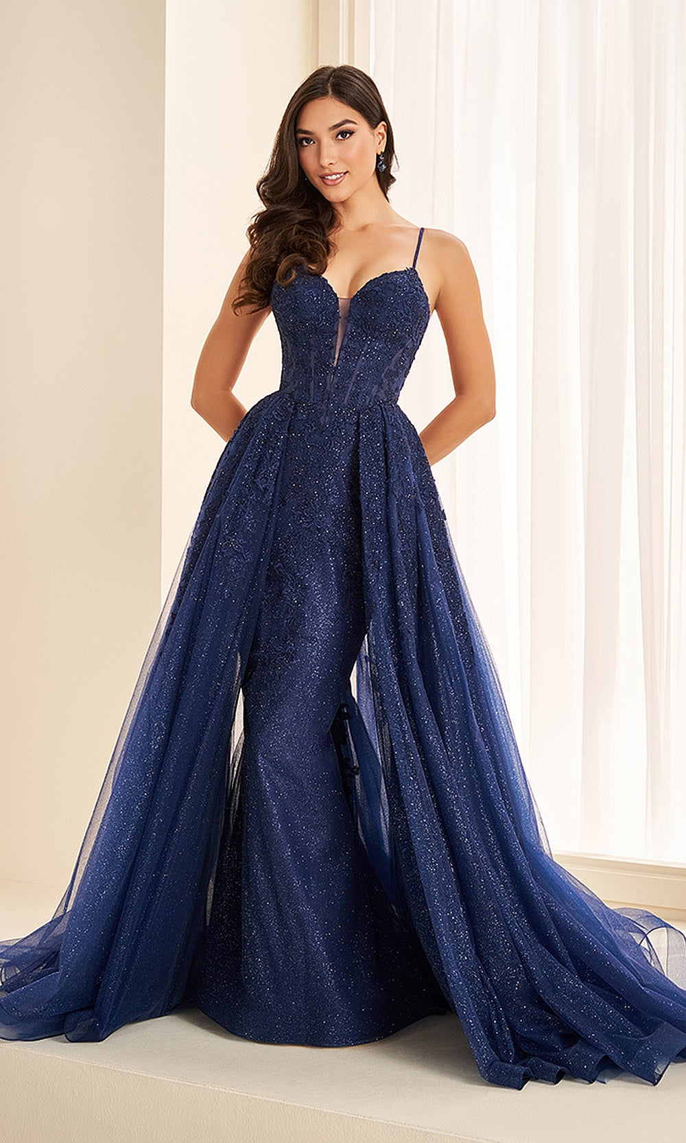 Ellie Wilde EW38095 Navy Blue prom dress front view with glitter tulle and lace, illusion floral appliqués, sweetheart corset A-line ballgown, evening gown.
