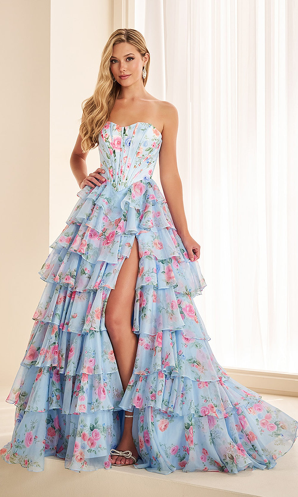 Ellie Wilde EW38127 Blue Multi prom dress front view with chiffon print, strapless corset bodice, tiered ruffle ballgown silhouette, an exquisite gala gown.