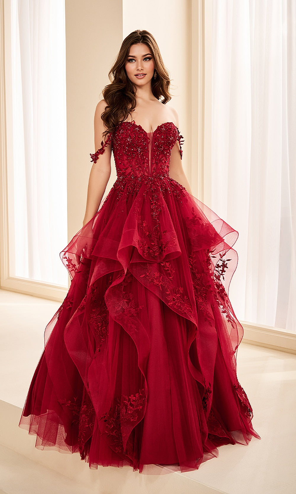 Ellie Wilde EW38211 Wine prom dress front view with glitter tulle, floral appliques, sweetheart corset bodice, ruffled ballgown skirt with train, evening gown.