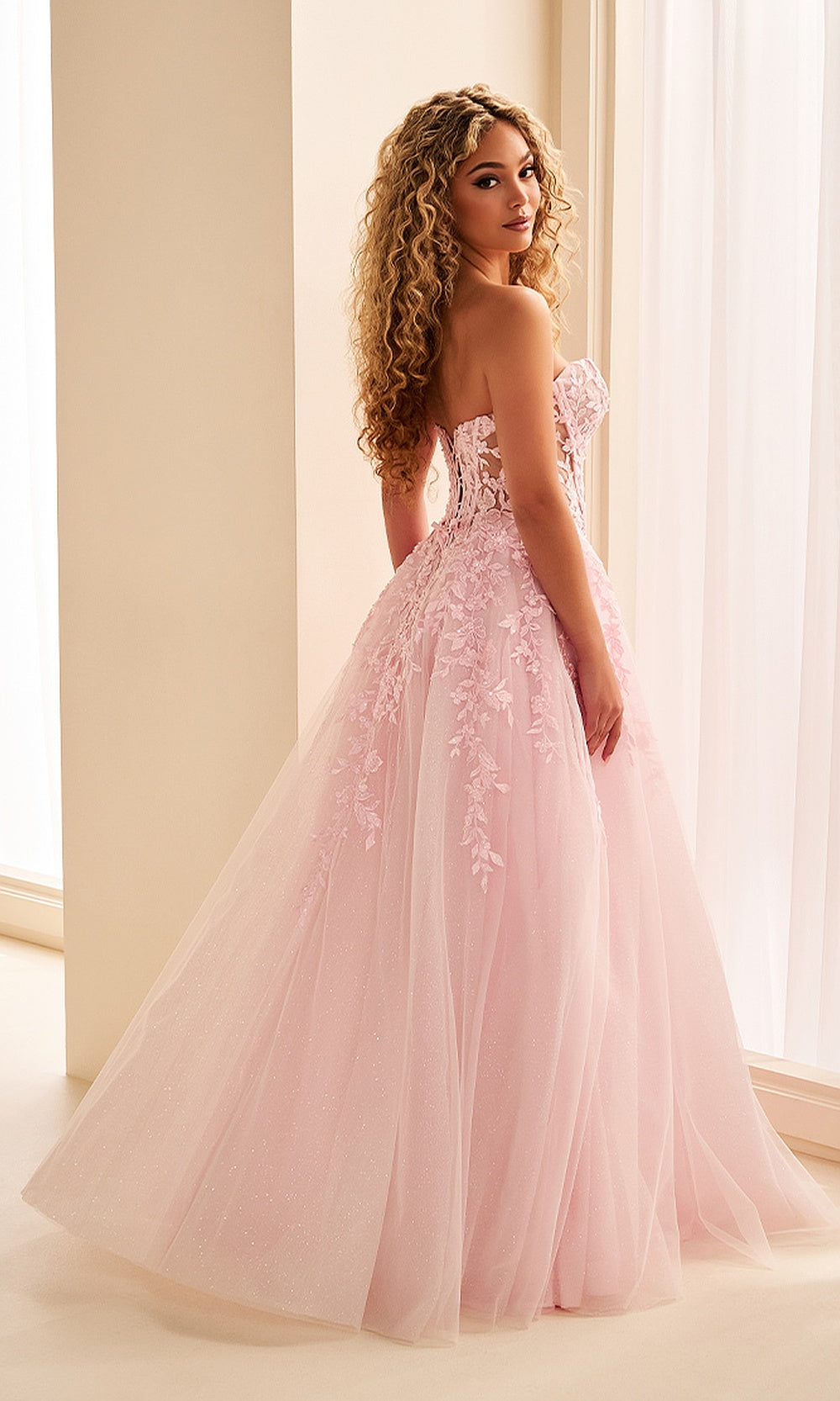 Ellie Wilde EW38221 Light Pink prom dress back view with organza and sequin fabric, corset back lace-up closure, sweetheart ballgown silhouette with train, evening gown.