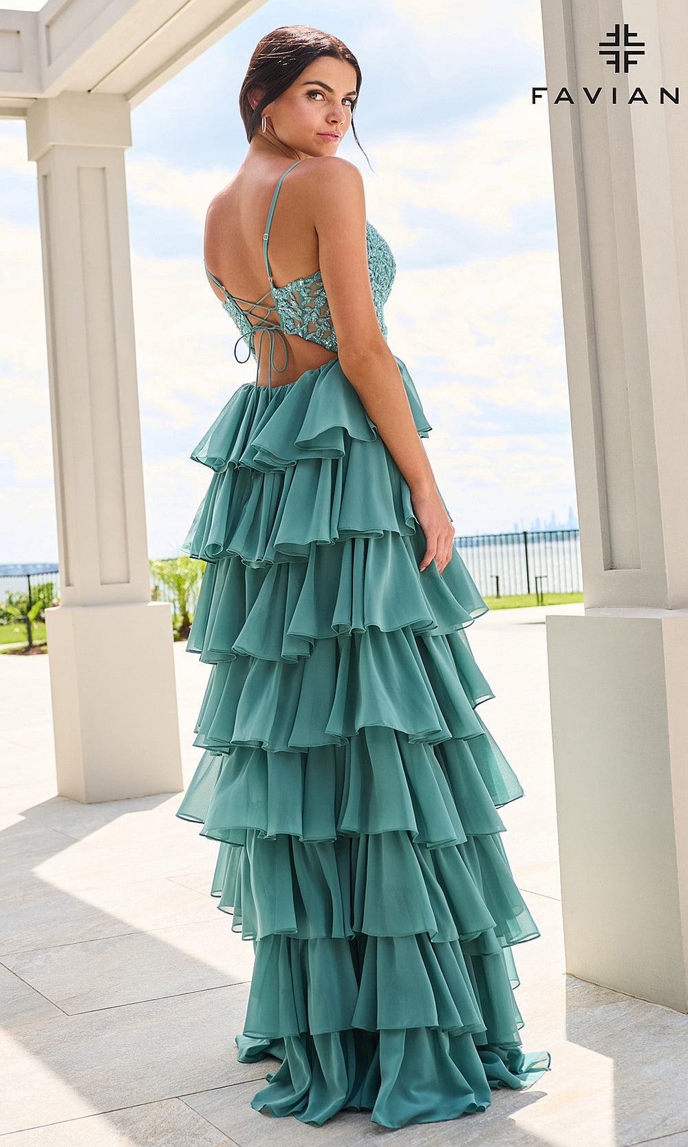 Faviana 11603 Dark Pacific Blue prom dress full-length back view with full open back, crisscross lace-up closure, floral lace bodice, tiered chiffon ruffle skirt, evening gown