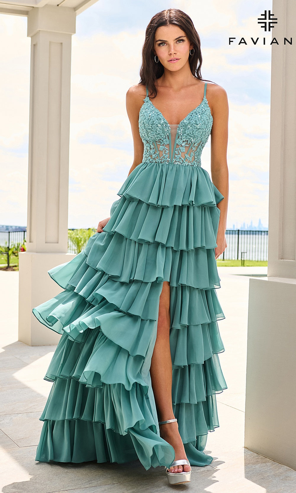 Faviana 11603 Dark Pacific Blue prom dress front view with floral lace bodice, beading, tiered chiffon ruffle skirt, V-neckline, spaghetti straps, formal prom gown