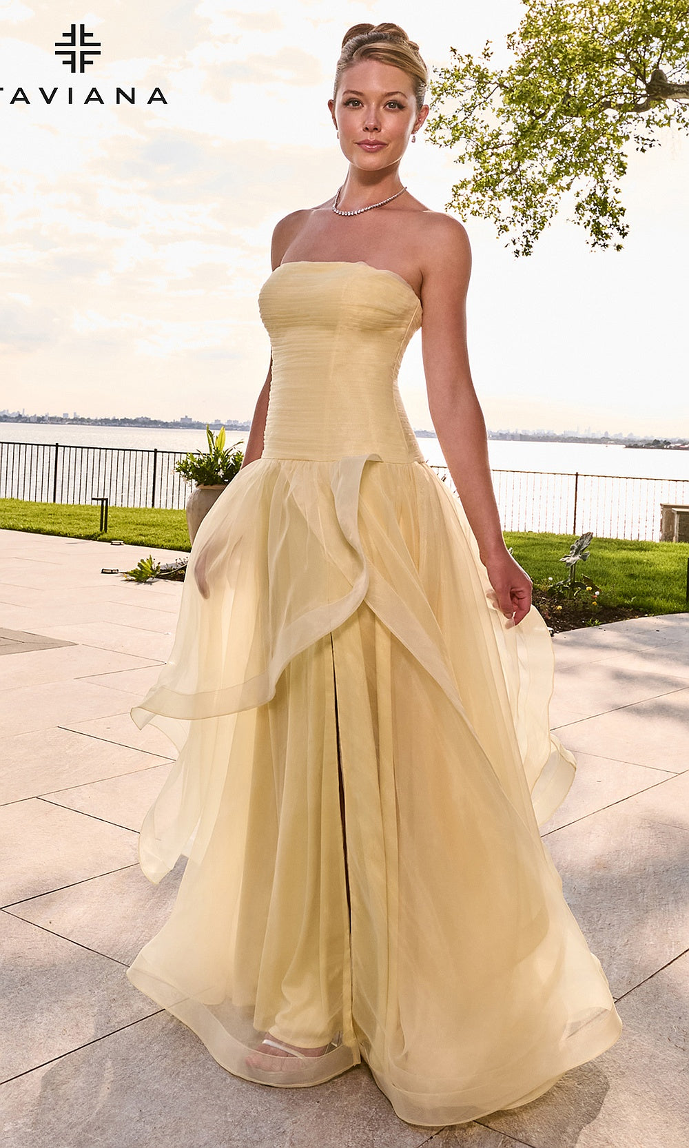 Faviana 11668 Butter Yellow prom A-line gown second front view full-length strapless silhouette draped organza layers floor-length gown elegant draped silhouette photographed in boutique studio lighting
