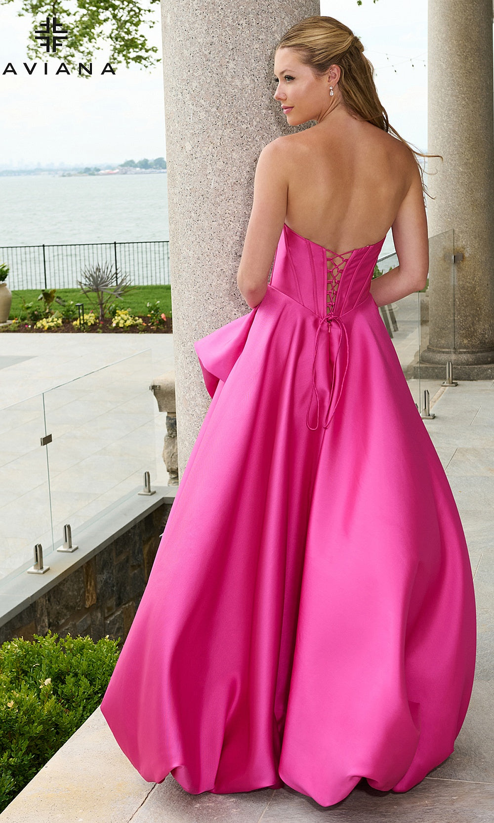 Faviana E11671 Wild Berry prom dress back full-length view of satin ballgown with lace-up corset closure and draped side panel, quinceañera gown styled for prom