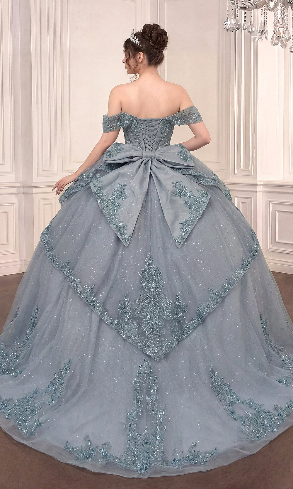 Ladivine 15729 Dusty Blue quinceañera ballgown back view, lace-up corset back, overskirt panel, extended train, sweet 16 ball gown