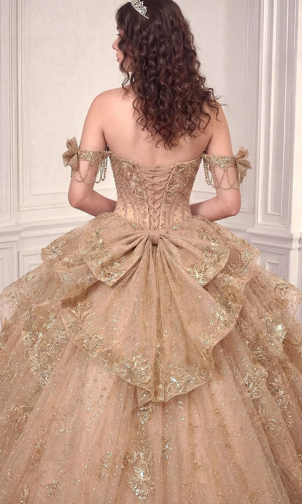 Ladivine 15743 Mocha Gold back view quinceañera ballgown with corset lace-up back, crystal chain strap detailing, voluminous tulle skirt, debut ball gown