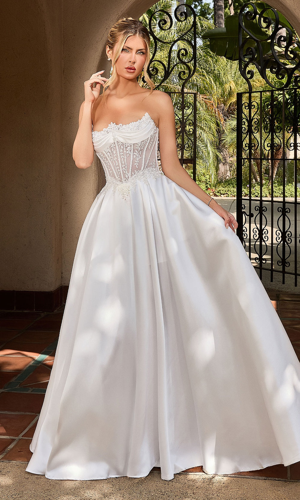 Ladivine CC511W off-white strapless illusion corset ballgown with floral lace appliqués, boning, and full satin skirt, front view, wedding gown