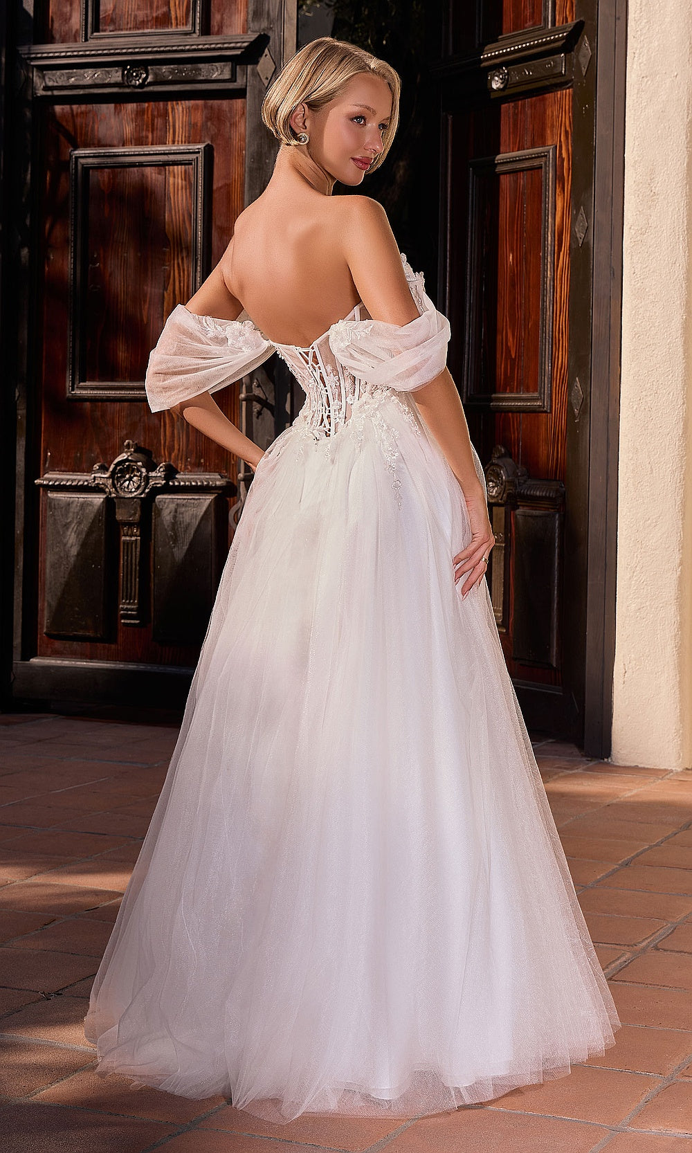 Ladivine CD2426W off-white back view wedding ballgown with full open lace-up corset back, tulle a-line skirt, exposed back to below waist, engagement party dress