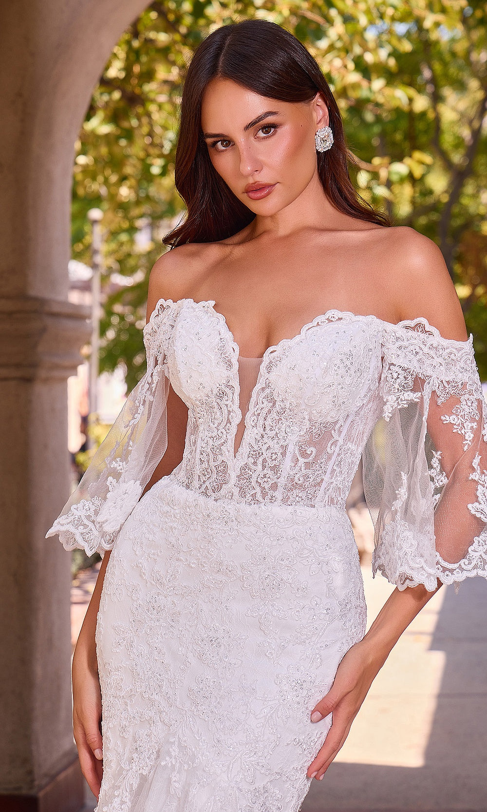 Ladivine CD659W off white detail view wedding gown with sheer illusion lace, visible boning channels, scalloped sweetheart edge, floral lace embroidery, wedding reception dress