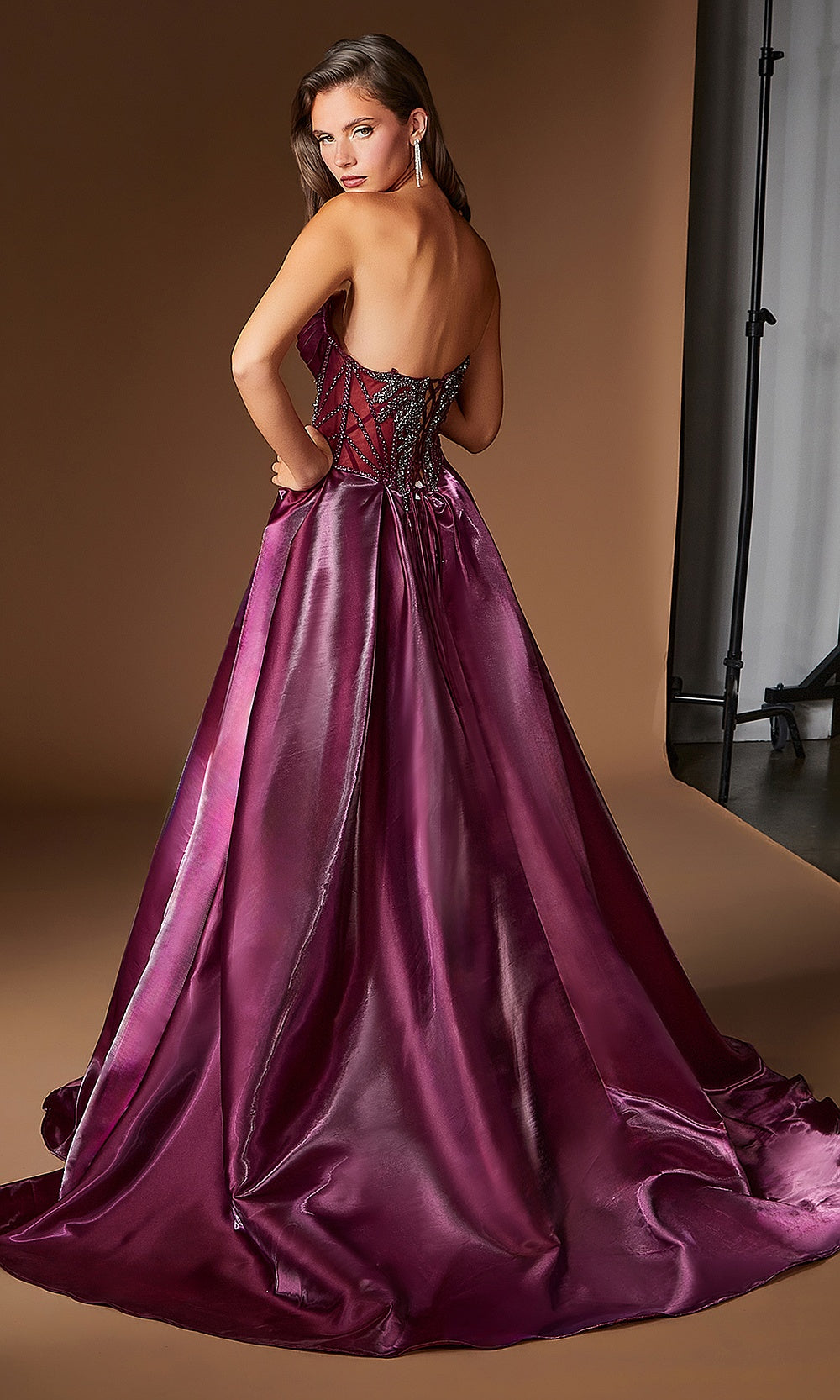 Ladivine CDS568 Plum Noir back view open lace-up corset closure fully bare back satin overskirt train prom gown red carpet styling