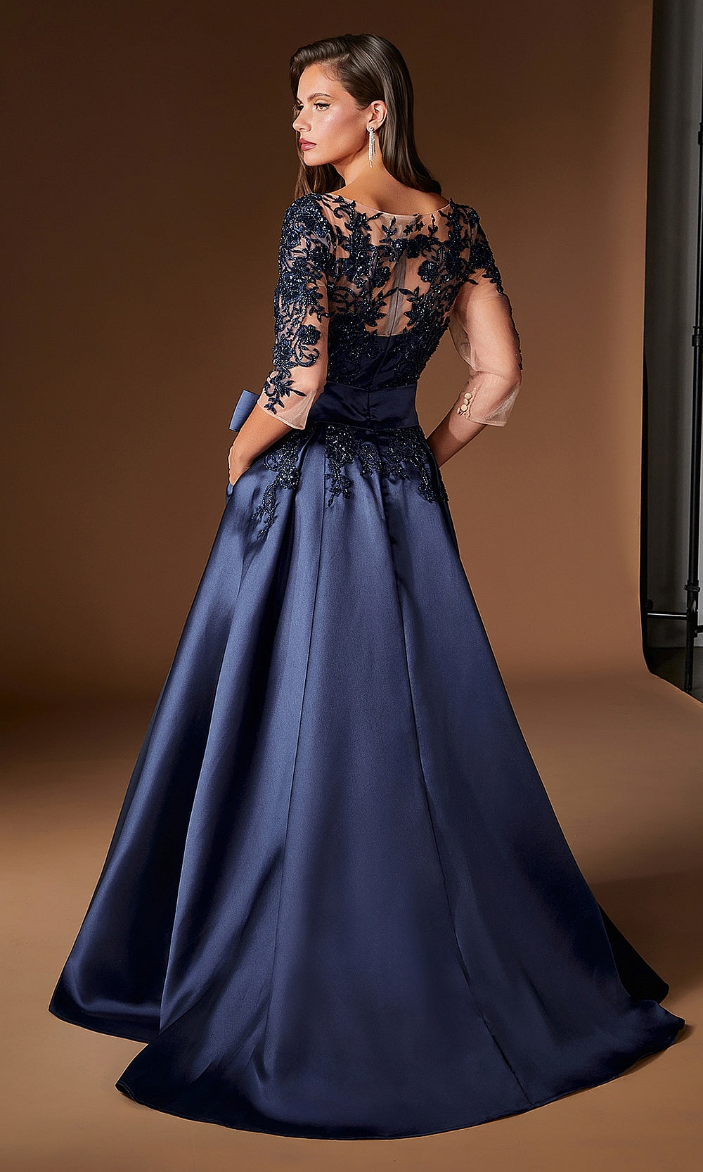 Ladivine CDS569 navy mother-of-the-bride gown illusion back with lace floral appliqués, high-back coverage, full a-line sweep train, back view, mother of the bride styling