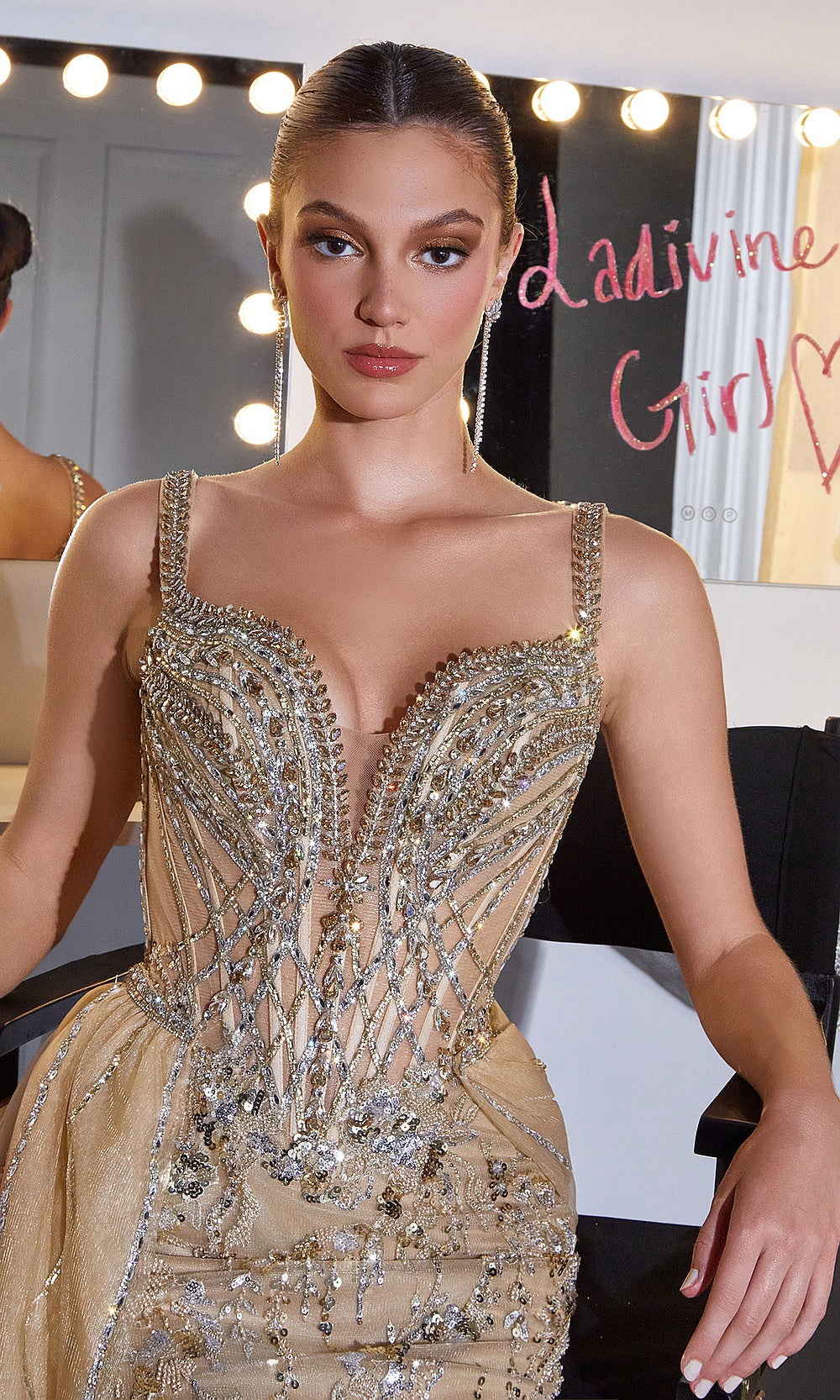 Ladivine CDS570 Gold prom dress bodice editorial detail, sweetheart neckline with illusion V plunge, beaded straps, visible boning channels, heavy crystal sequin beading, evening gown