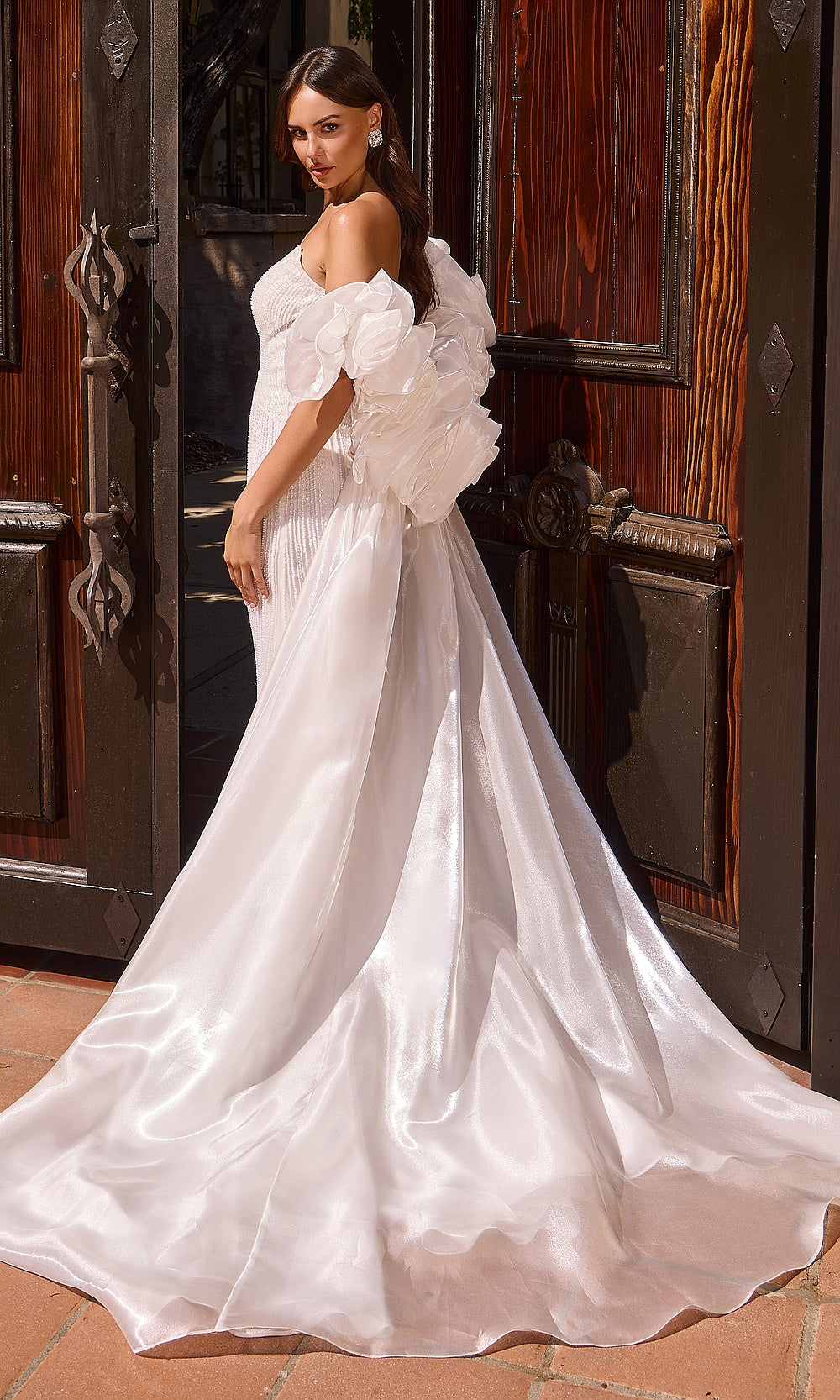 Ladivine CJ933W off white beaded mermaid wedding gown side view with train, organza puff sleeves worn off shoulder, boned bodice, engagement party dress