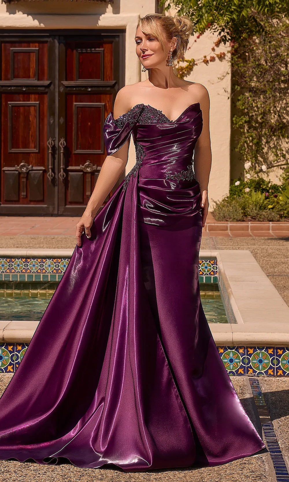 Ladivine J916 eggplant prom front view fitted mermaid gown with satin fabric, beaded bust accents, off-shoulder sweetheart neckline, draped overskirt, red carpet styling