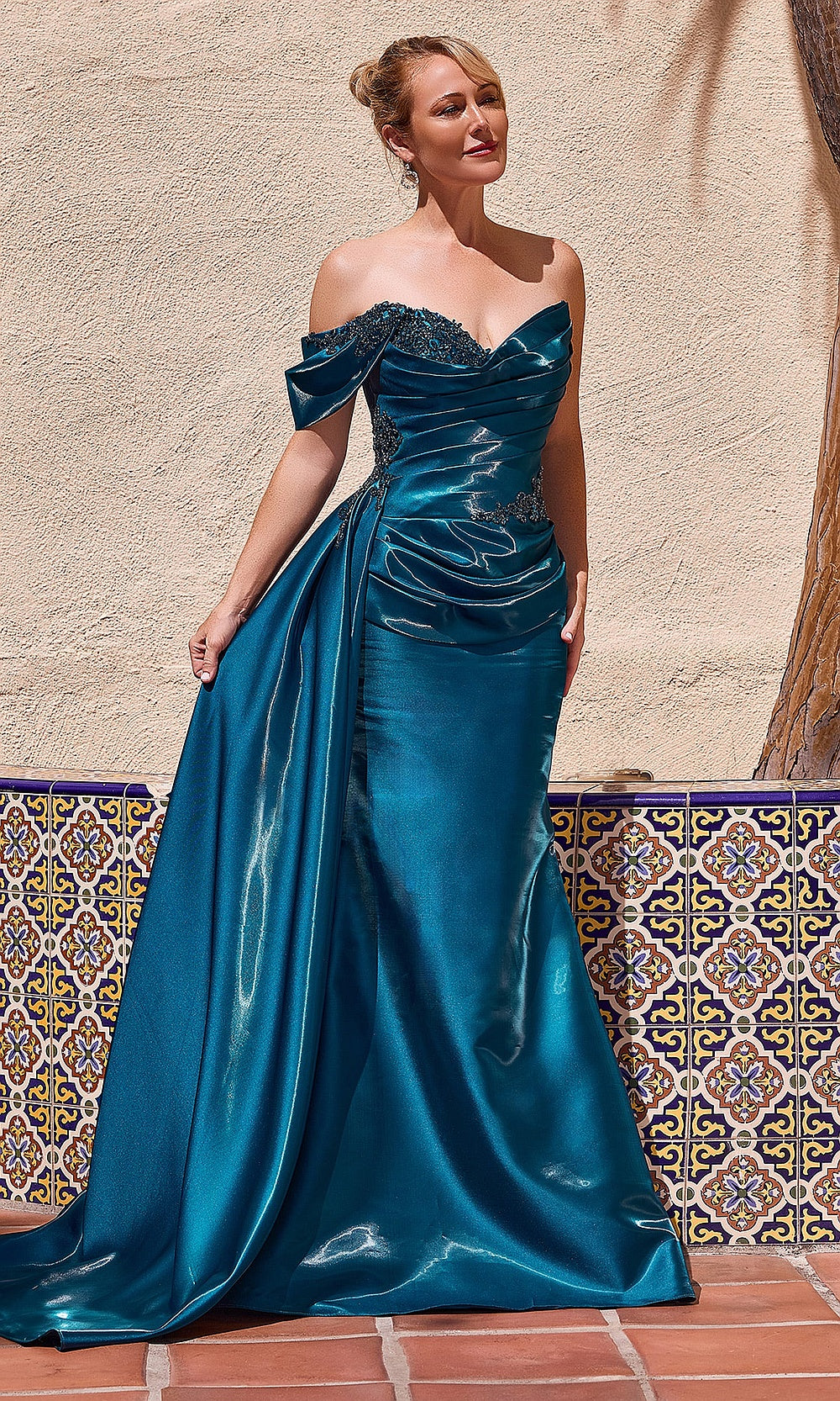 Ladivine J916 peacock prom front view fitted mermaid gown with satin fabric, beaded bust accents, off-shoulder sweetheart neckline, draped overskirt, black-tie event dress